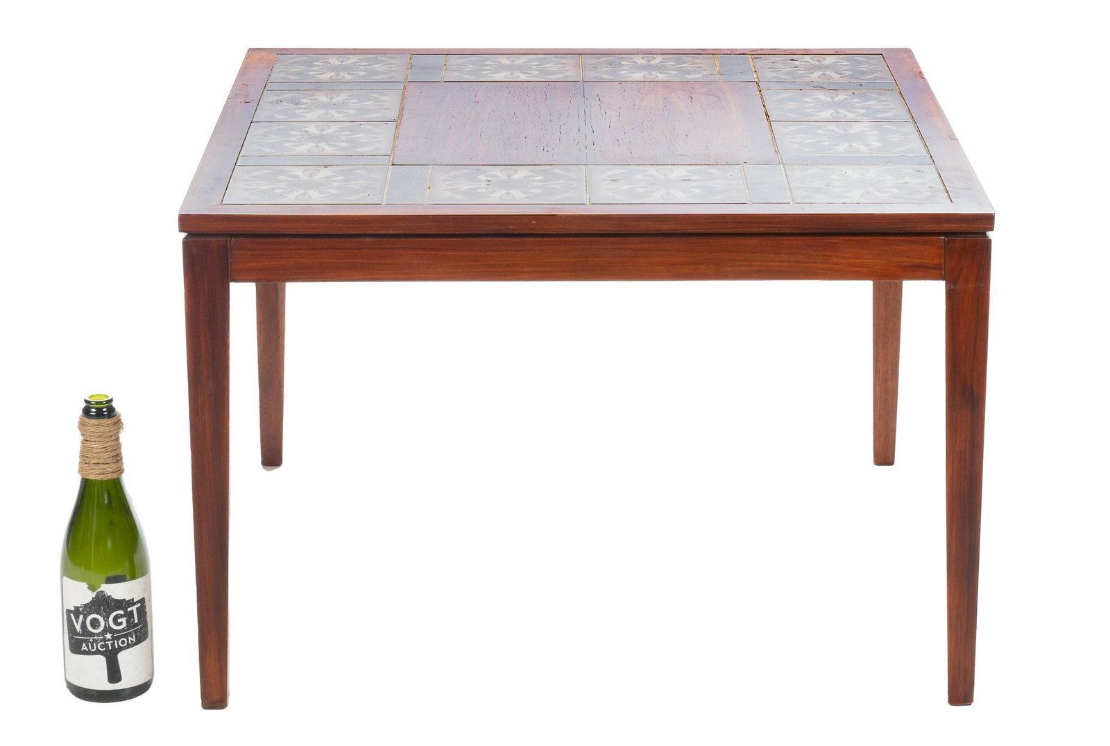 Danish Mid-Century Tile Top Side Table: Danish Mid-Century tile top side table, featuring tile inlay with flour motif, supported on tapered legs 19.5"h x 30"w x 30"d We happily provide seamless shipping services on everything we sell. Pleas