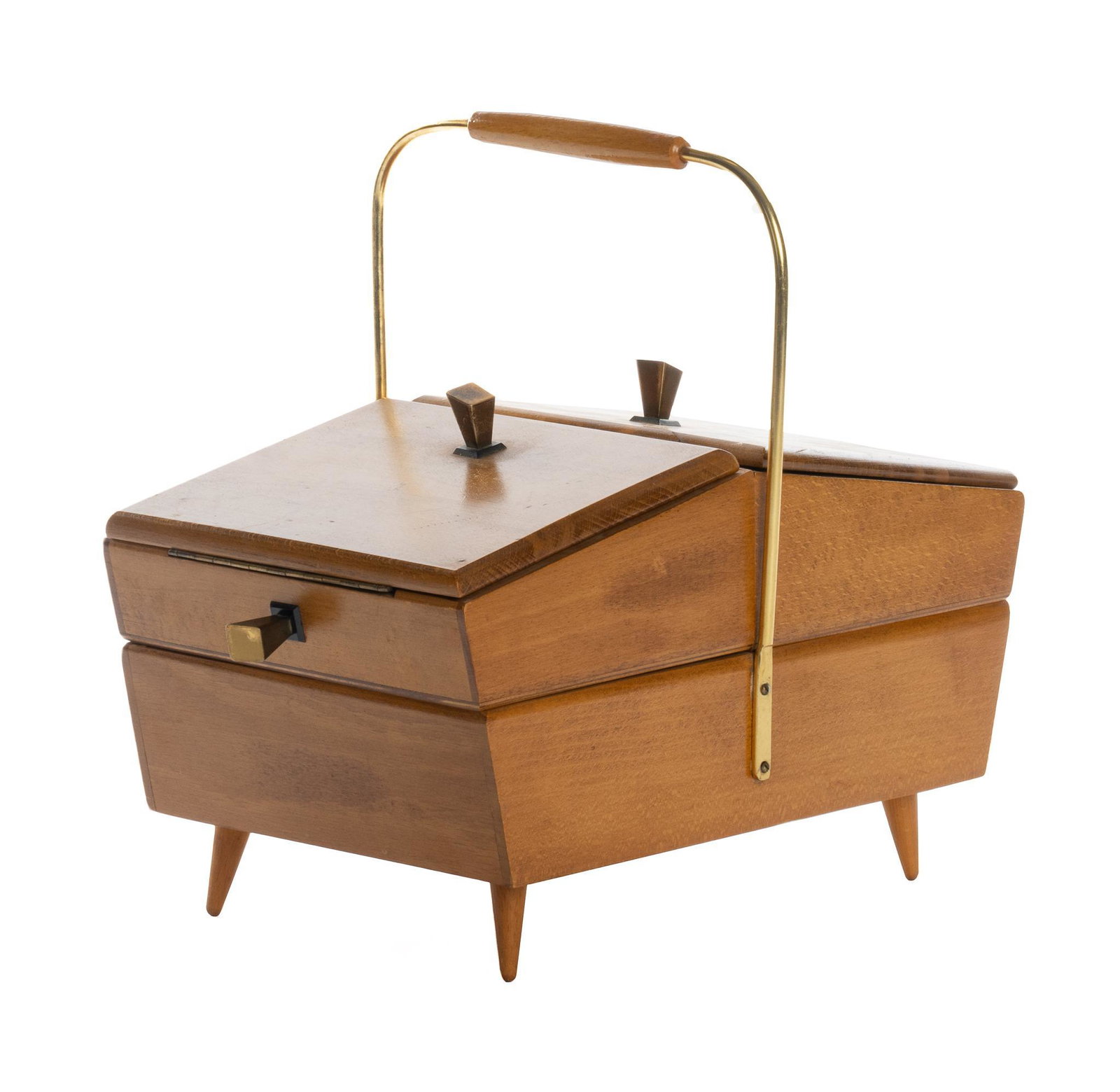 Mid-Century Expanding Sewing Box: Mid-Century expanding sewing box, having hinge doors, with brass pulls, opening to interior compartments, rising on pin feet 12.5"h x 14.5"w x 9"d We happily provide seamless shipping services on ever