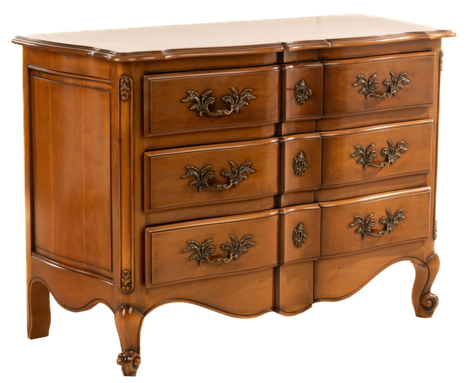 Louis XV Style Commode: Louis XV style fruitwood commode, having carved top over three stacked drawers over carved serpentine apron, featuring scroll motif and brass toned hardware, rising on cabriole legs 32.5"h x 37&#