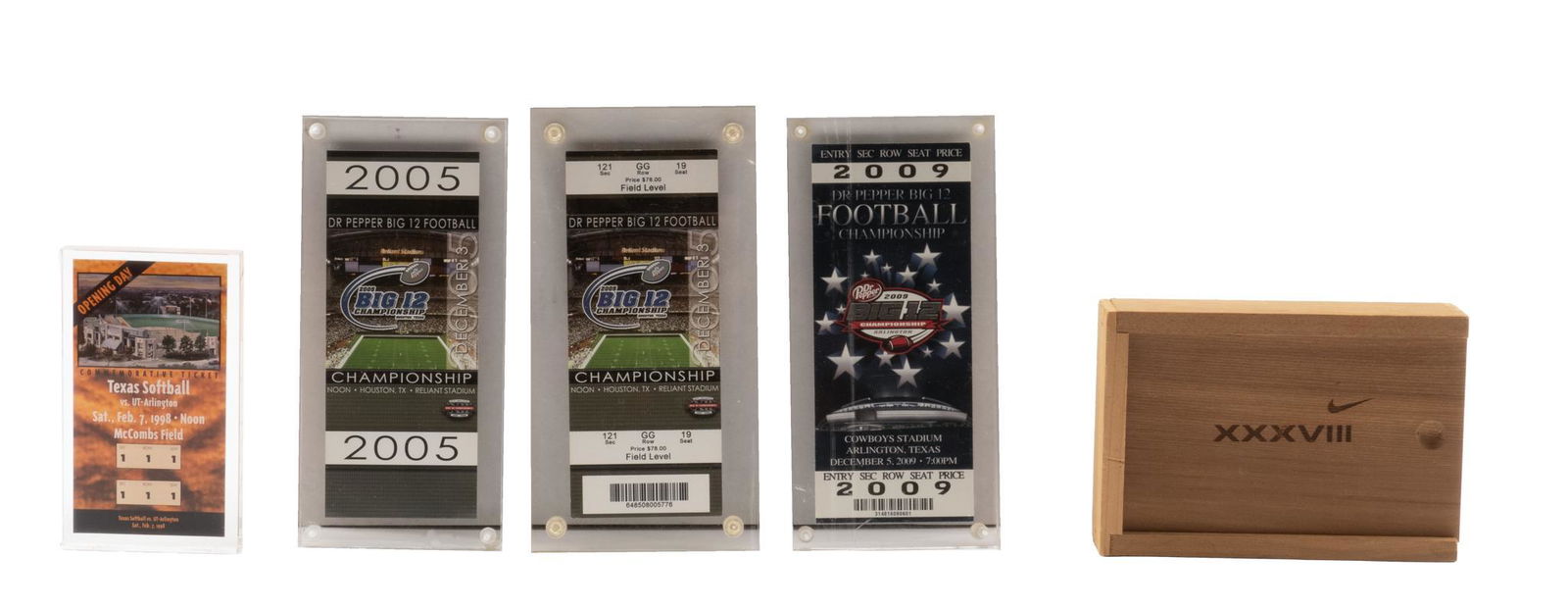 University of Texas and Superbowl XXXVII Tickets: 2 2005 University of Texas Big XII Championship in Houston tickets in Lucite, 1 2009 Big XII Championship in Dallas ticket in Lucite, 1 1998 University of Texas Softball opening day ticket in Lucite,