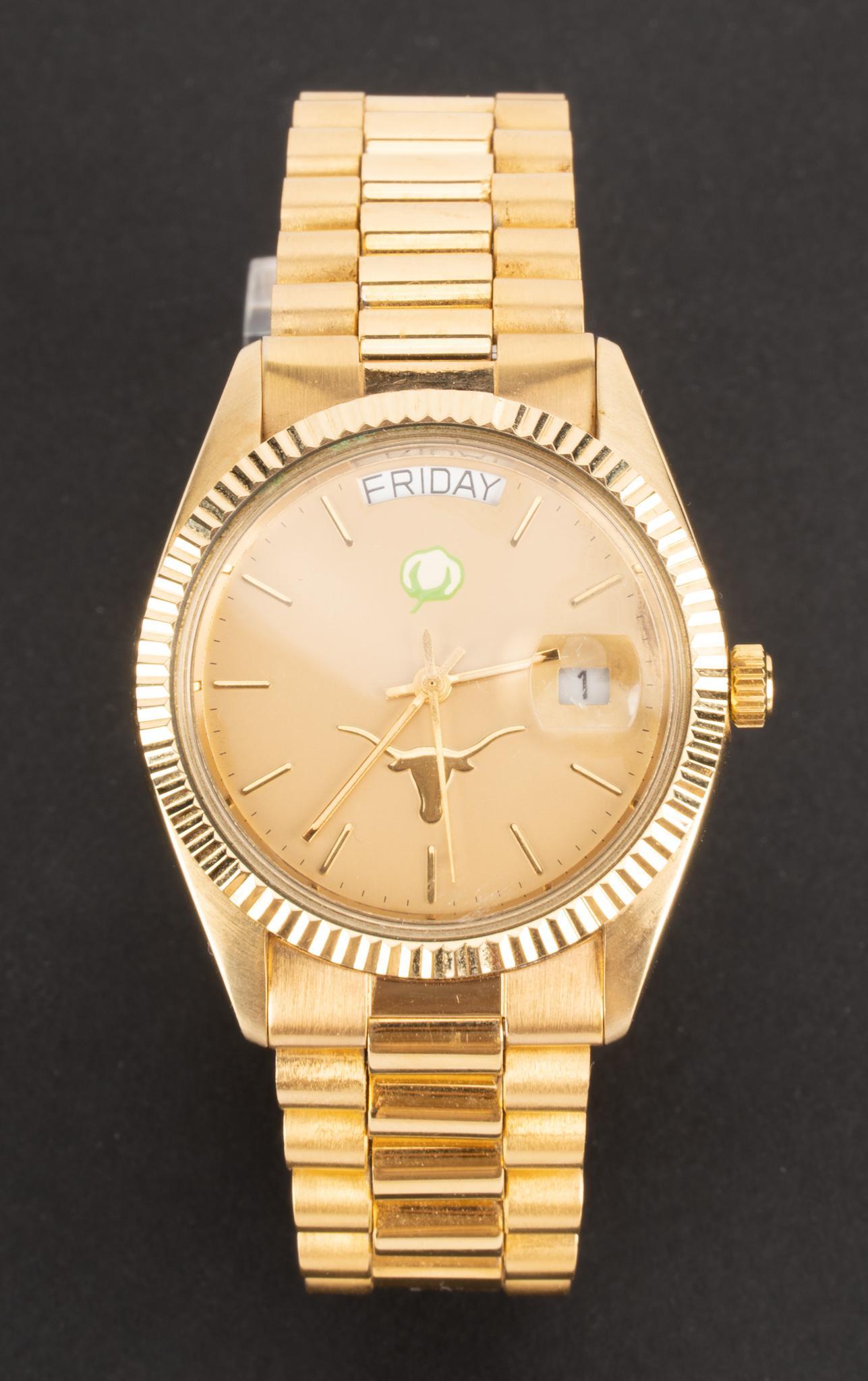 Cotton Bowl University of Texas Special Presentation Watch: Official special issue commemorative University of Texas Longhorns college football Cotton Bowl gold tone wristwatch by Tangent Corporation. Condition: Shows light wear; not running, will need new ba