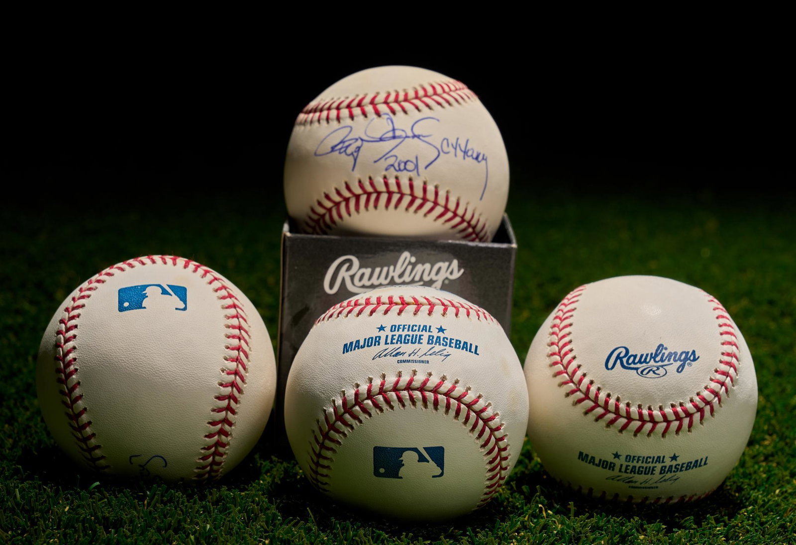 Set of 4 Roger Clemens Signed Baseballs: Set of 4 Roger Clemens signed Rawlings MLB baseballs. 1 signed "Roger Clemens Cy Young 2001" and 3 signed "Roger Clemens Cy 7" Provenance: The Estate of Larry Falk, University of Texas at Austin Assis