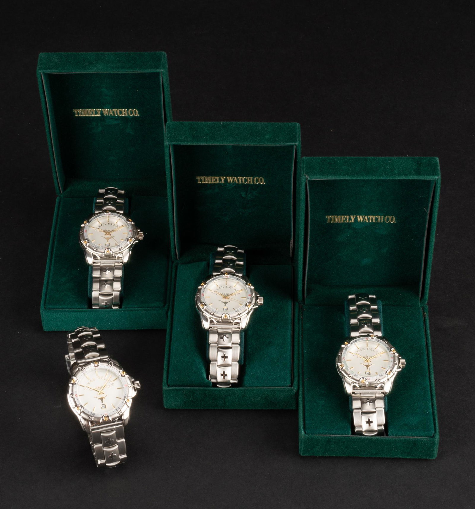 University of Texas Longhorns Relay Champions Watches: Official issue Texas Relays Championships College Track and Field, University of Texas Longhorns, men's stainless wristwatches, by Timely Watch Company; all new old stock (one without box). Condition: