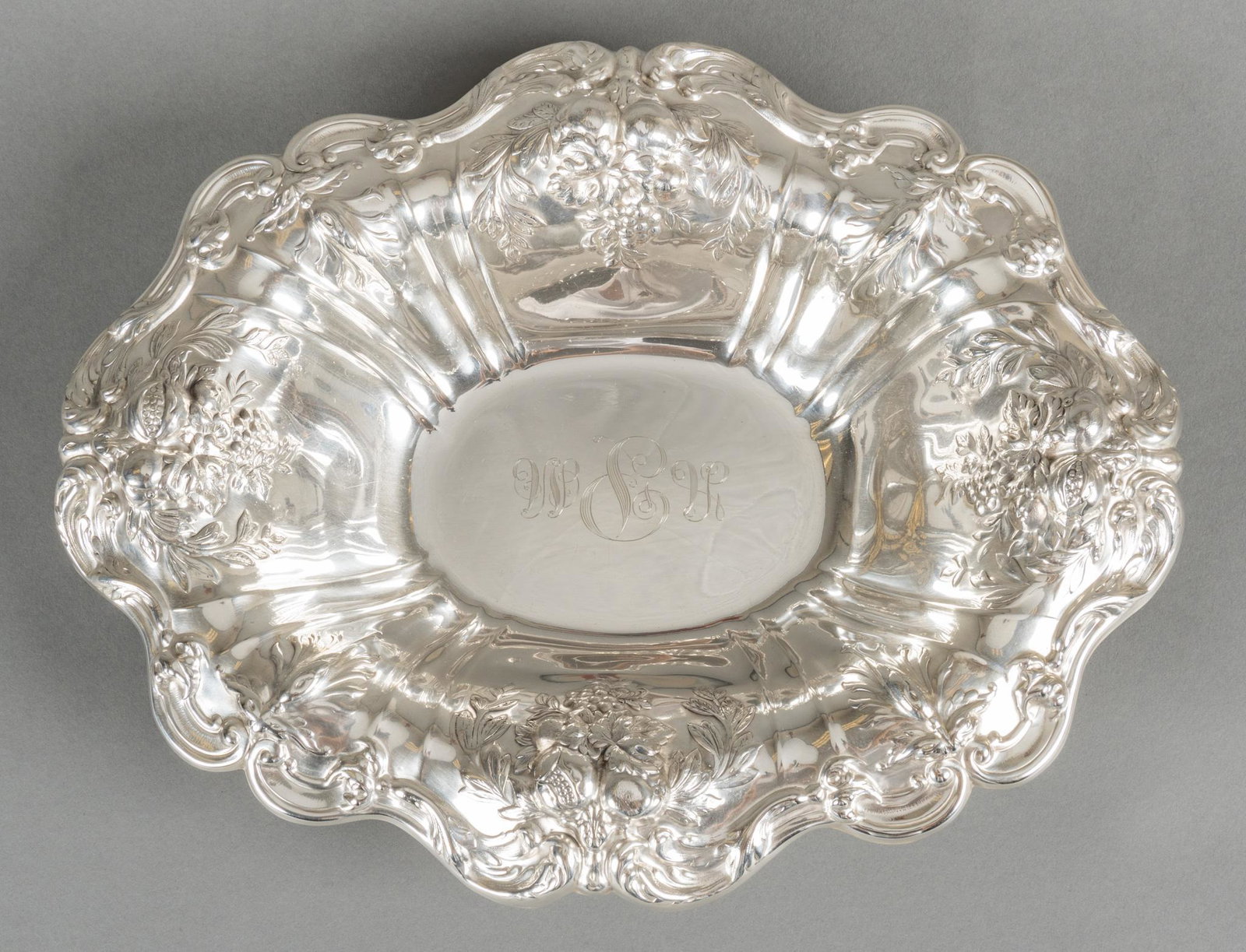 "Francis I" Sterling Silver Oval Serving Bowl: Sterling silver oval serving bowl, no x566, by Reed and Barton Silversmiths from the 'Francis I' line; monogrammed center. Length 12 1/2", width 10"; total weight 20.06 ozt We happily 