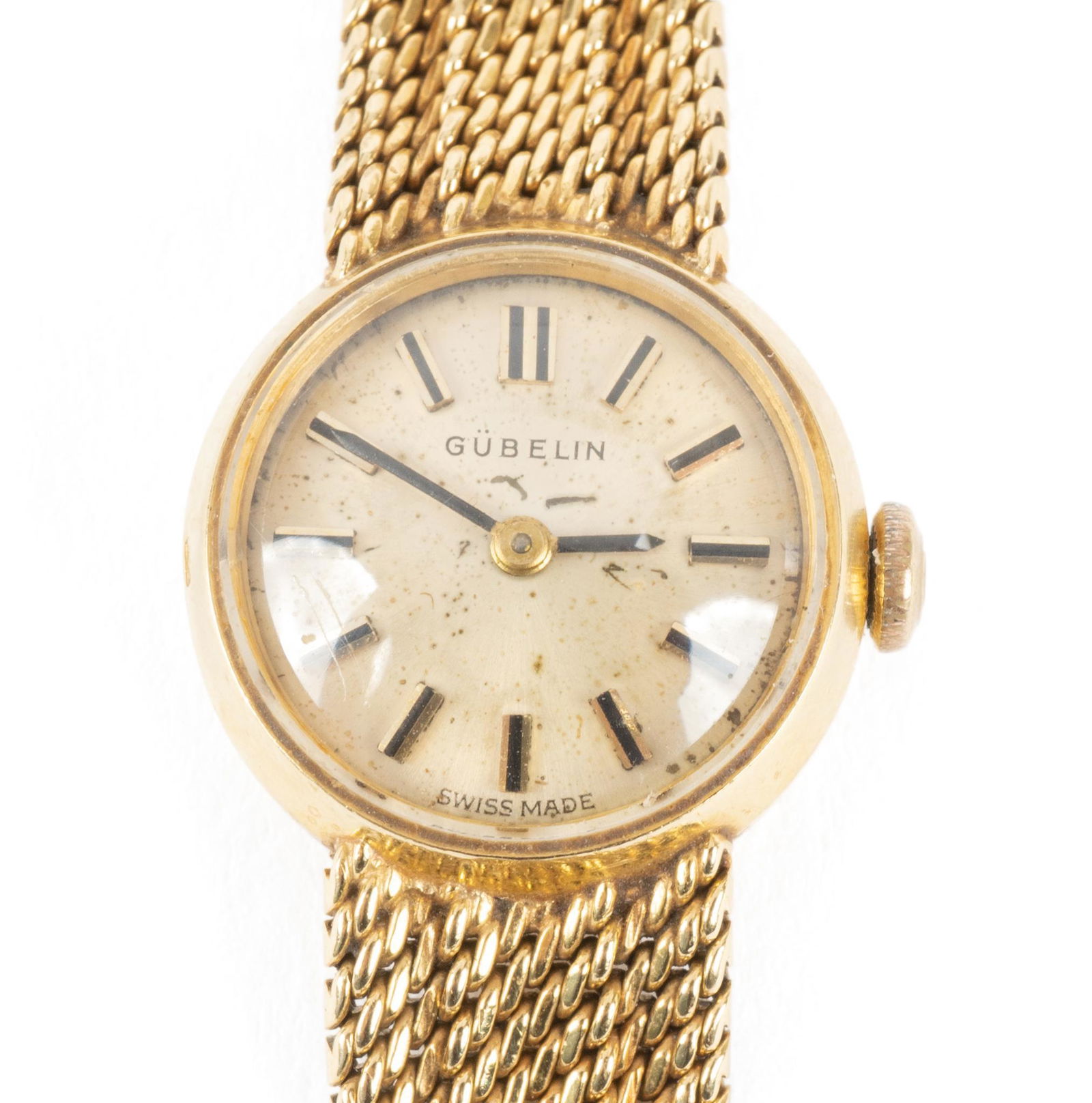 Vintage Gubelin 18k Gold Ladies Wristwatch: Vintage ladies Gubelin wristwatch with 18k yellow gold case and tapered woven band Case diameter (including crown) 18mm; band length adjustable 6" or 6 1/4"; total weight 26.6 grams Conditio