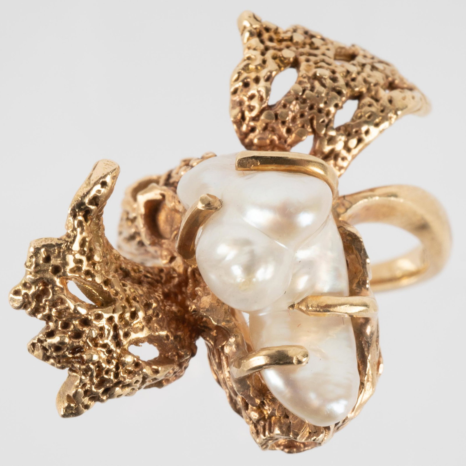 Modernist Baroque Pearl 14k Gold Ring: Baroque pearl in Modernist 14k yellow gold setting. Ring size 6.5; total weight 9 grams Provenance: The Estate of Brigadier General Mary Marsh (Universal City, Texas) We happily provide seamless shipp