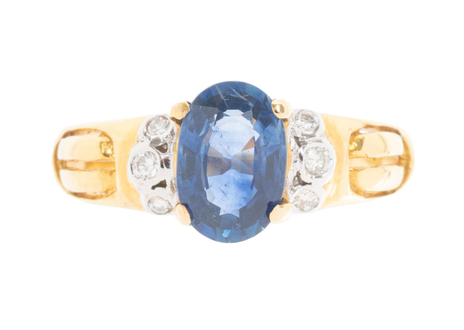 Thailand Sapphire Diamond 18k Gold Ring: Oval sapphire framed with diamonds set in 18k yellow gold. Ring size 6; total weight 2.9 grams Provenance: A San Antonio, Texas collection We happily provide seamless shipping services on everything w