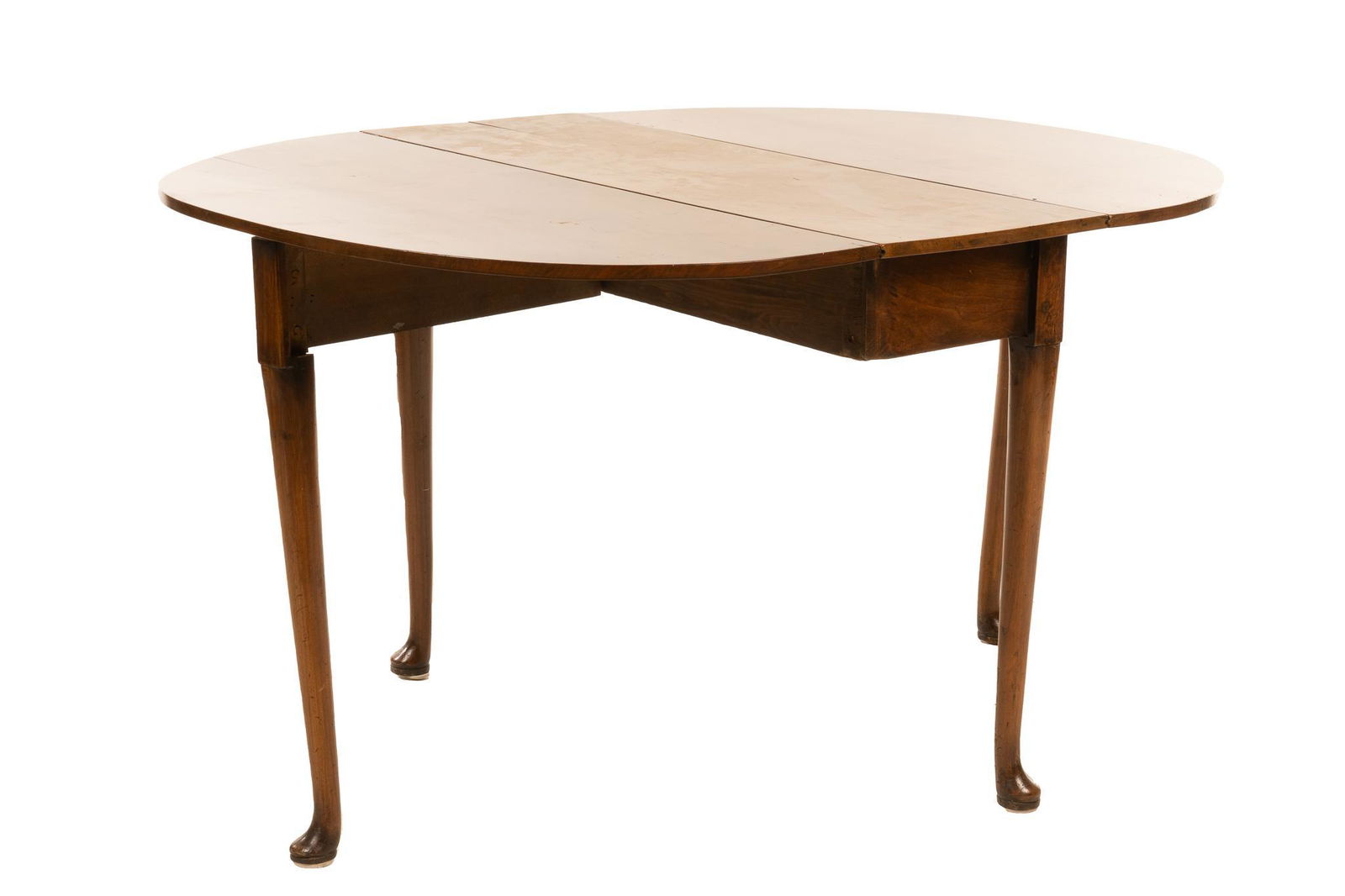 Queen Anne Style Drop Leaf Table: Queen Anne style drop leaf dining table, having round top, two hinged leaves, supported on pad feet 27.5"h x 38"w x 44"d Provenance: An Alamo Heights, Texas collection We happily provid