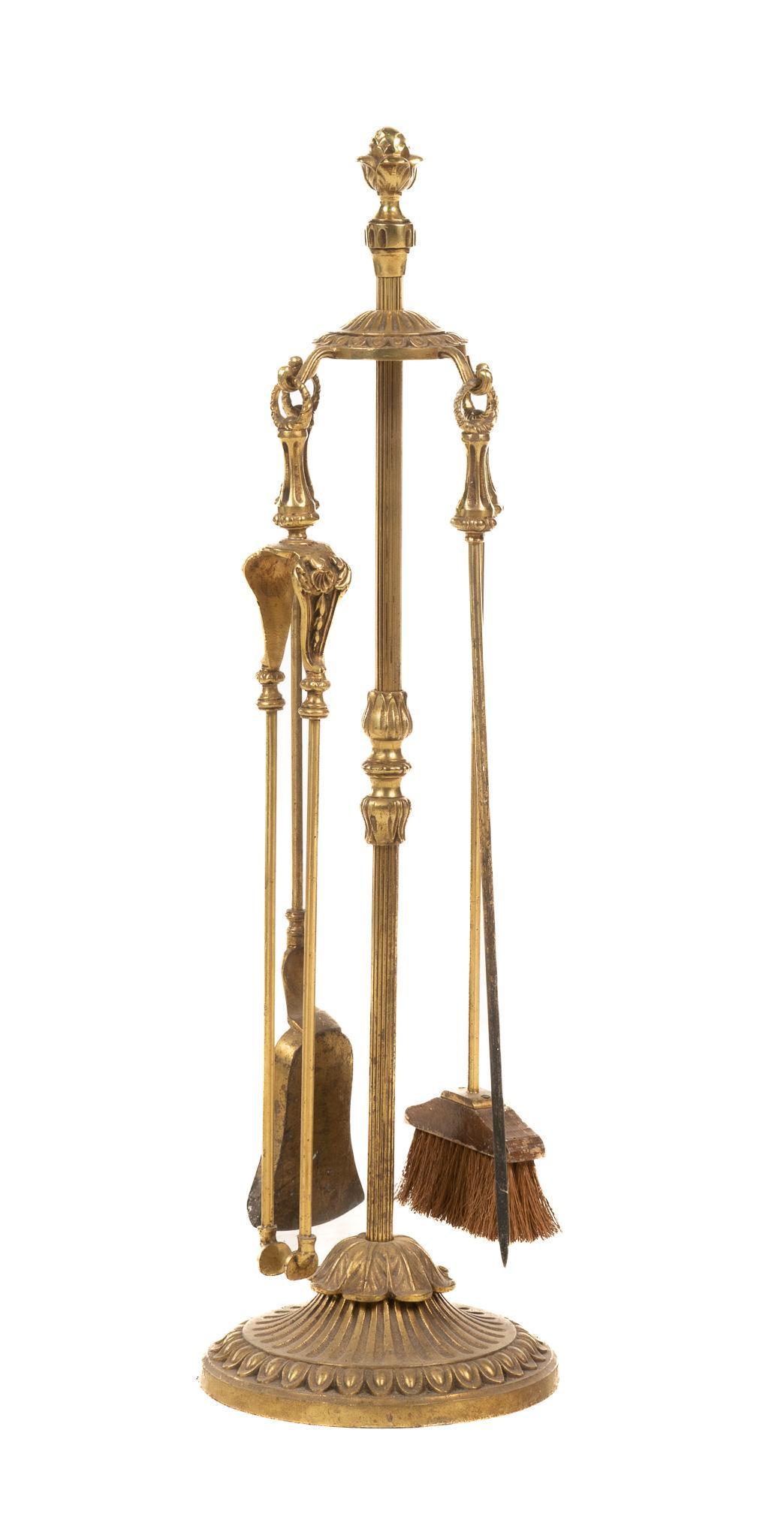 Brass Fireplace Companion Set: Brass fireplace companion set to include four tools and matched fluted stand 33"h x 12"w x 12"d We happily provide seamless shipping services on everything we sell. Please email us at ship