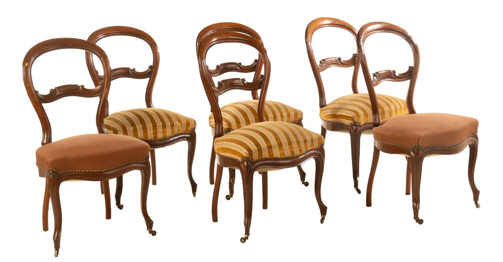 Set of (6) Louis Philippe Style Dining Chairs: Set of six Louis Philippe style dining chairs, with walnut frames, having round backs, upholstered seats, featuring carved scroll motif, rising on cabriole legs ending in casters, circa late 19th cent