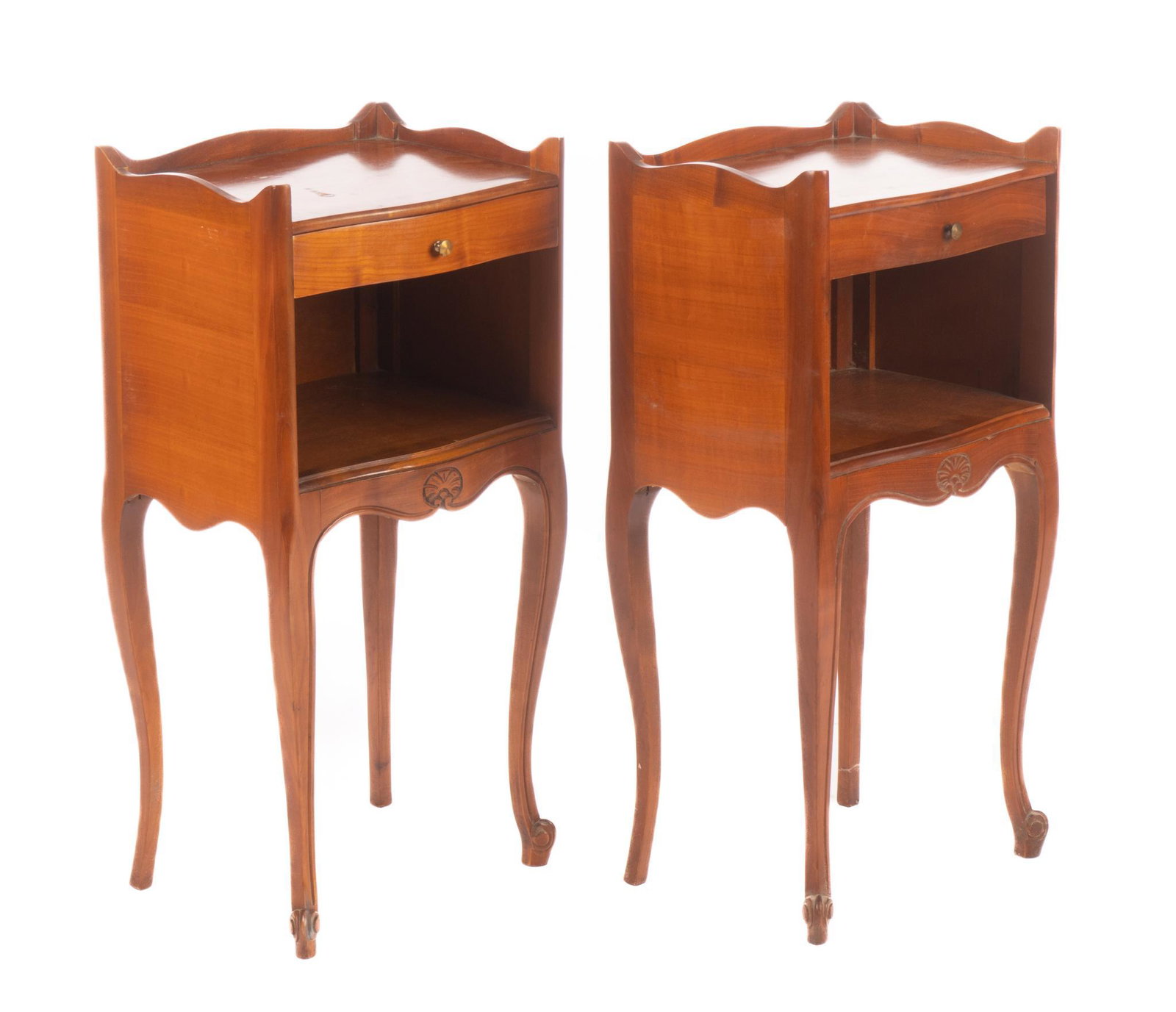 Pair of Louis XV-style Nightstands: Pair of matching Louis XV nightstands, having carved serpentine gallery, above drawer, open cabinet space, featuring scalloped apron, with shell motif, rising on cabriole legs 27"h x 13.5 x 10"
