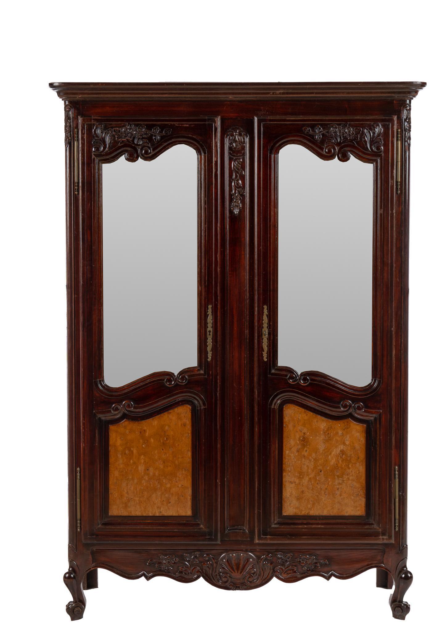 Louis XV Style Curio Cabinet: Louis XV style curio cabinet with carved floral motifs, having two doors opening to a mirror backed upper interior with a single shelf, supported on cabriole legs and to include a key Note: matching