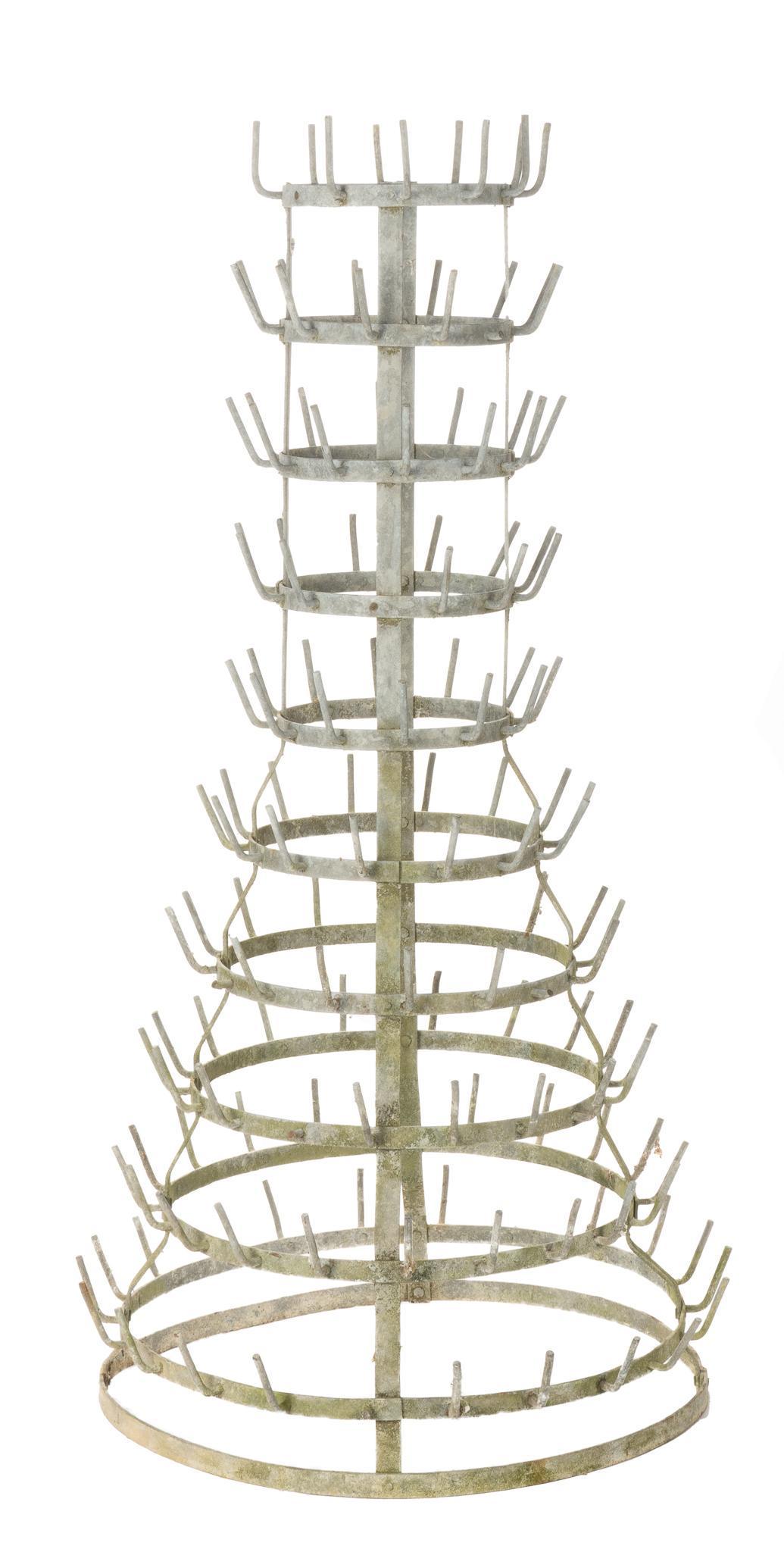 French Vineyard Bottle Holder: Large freestanding metal French vineyard wine bottle holder 47h x 23w x 23d We happily provide seamless shipping services on everything we sell. Please email us at shipping@vogtauction.com or call 210
