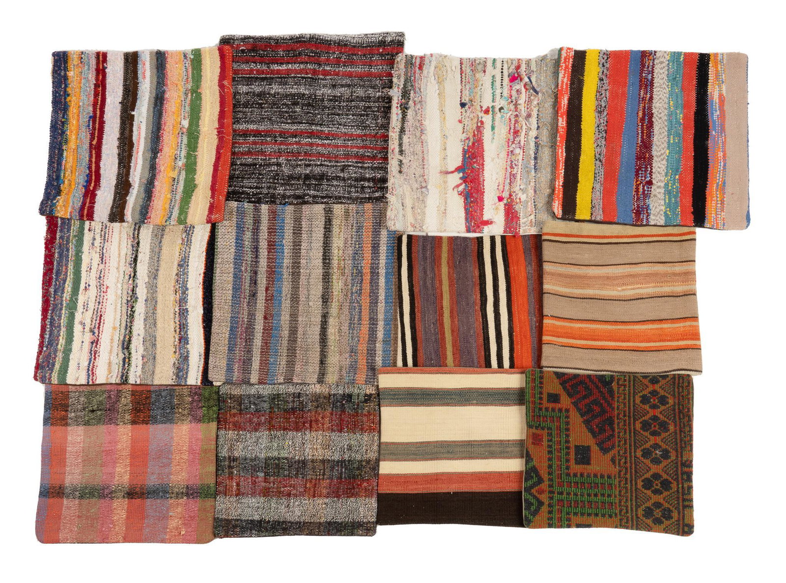 Set (12) of Hand-Woven Kilim Throw Pillowcases: Collection of twelve throw pillowcases, made from re-purposed hand-woven Turkish Kilims 1";7 x 1";7 / largest Provenance: A Houston, Texas collection We happily provide seamless shipping services on e