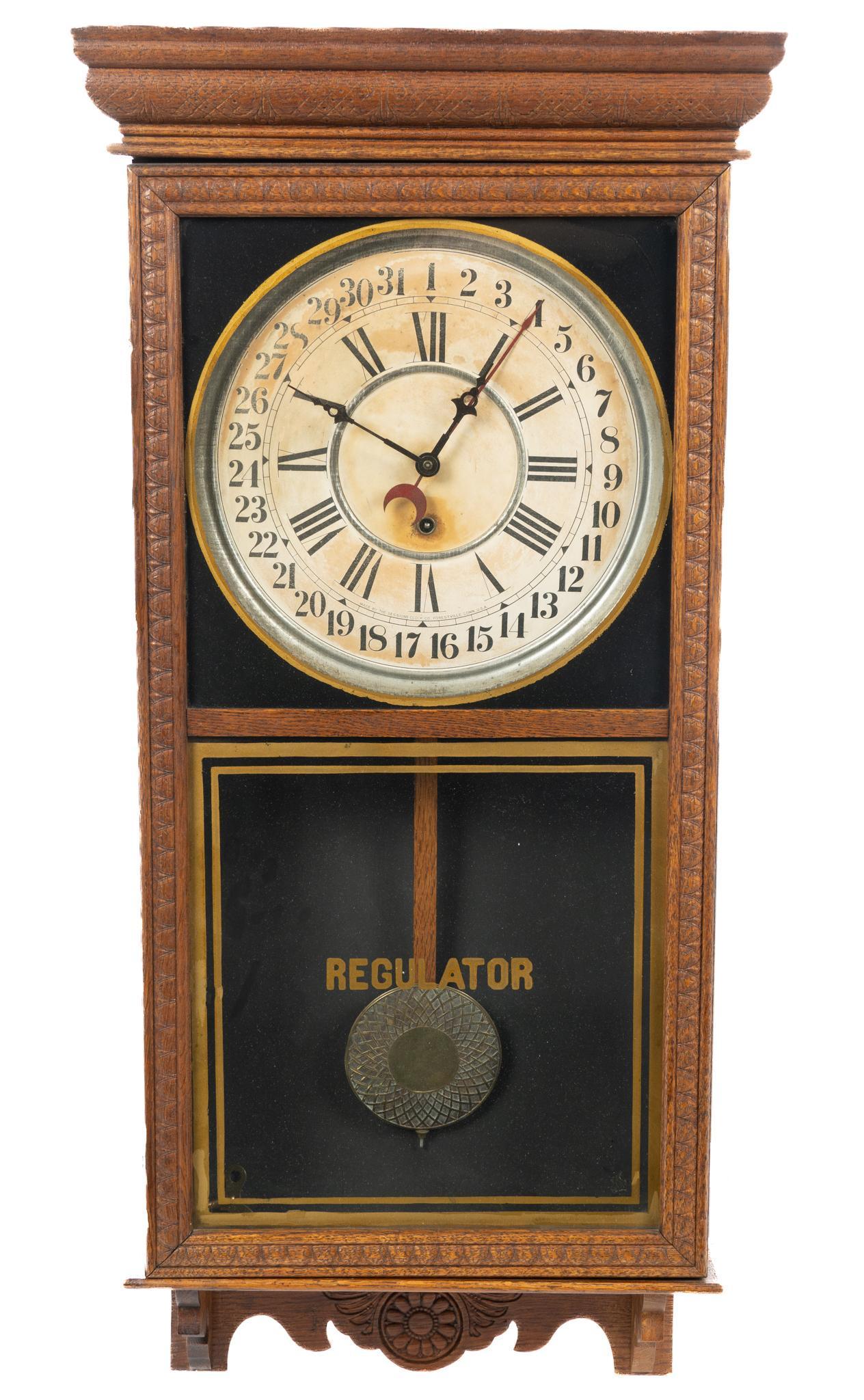 Sessions Clock Co. Regulator Wall Clock: Sessions Clock Co. (Connecticut, USA) regulator wall clock, 8 day time and calender, overhanging top and lightly carved case, glass inset door with "Regulator" marked on bottom glass panel ope
