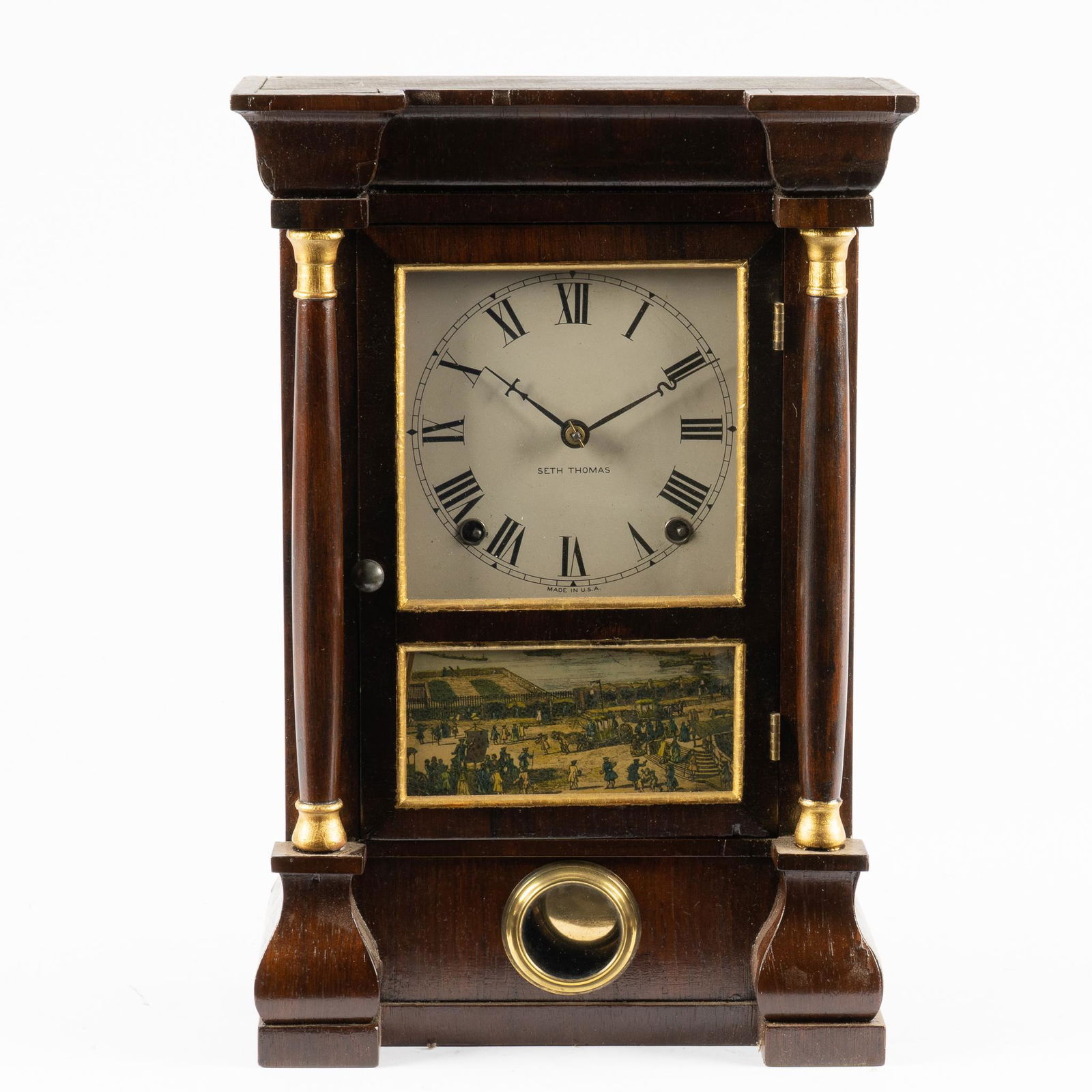 Seth Thomas Clock Co. Shelf Clock: Seth Thomas Clock Co. (Connecticut, USA) shelf clock, 8 day time and strike, housed in wooden case, with architectural elements and gilt accents, such as two pillars, flanking glazed door, featuring i