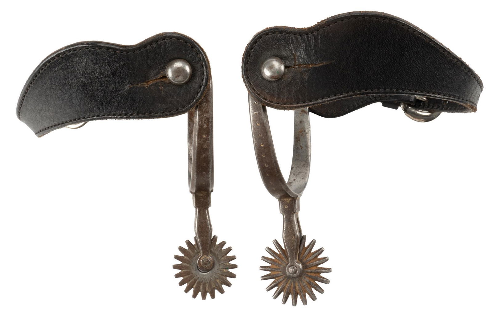 Early Iron Spurs: Early iron spurs, heel bands marked "Forged Steel Pat'd", 20 point rowels, attributed to August Buermann height 0.5 in. x width 3 in. x depth 9 in. Provenance: An Alamo Heights, Texas co