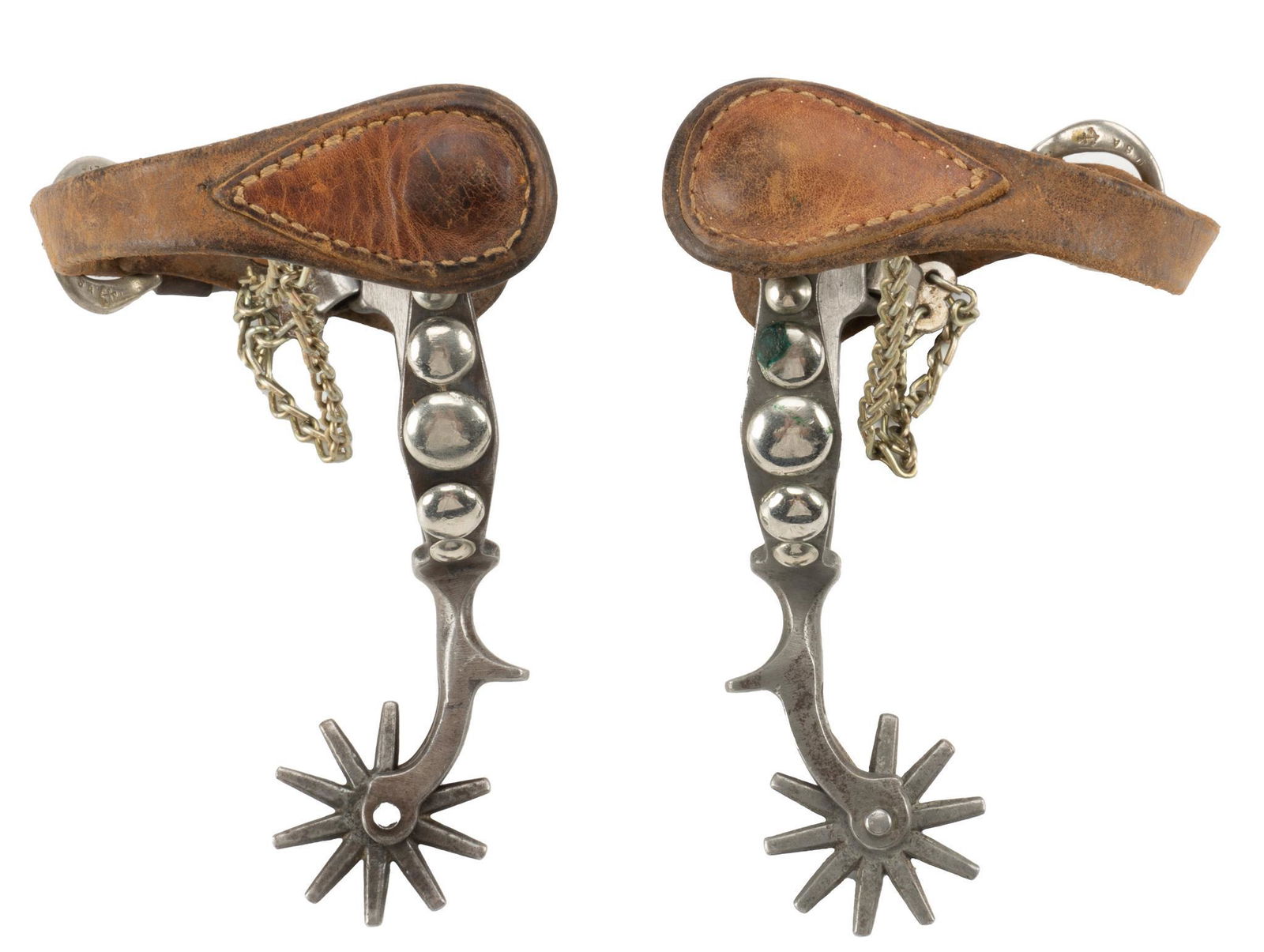 Iron 5 Spot Spurs: Iron 5 spot spurs, buckles North and Judd marked "Solid Brass USA" and with an anchor symbol, heel chains, 10 point rowels, attributed to August Buermann height 1 in. x width 4 in. x depth 9.