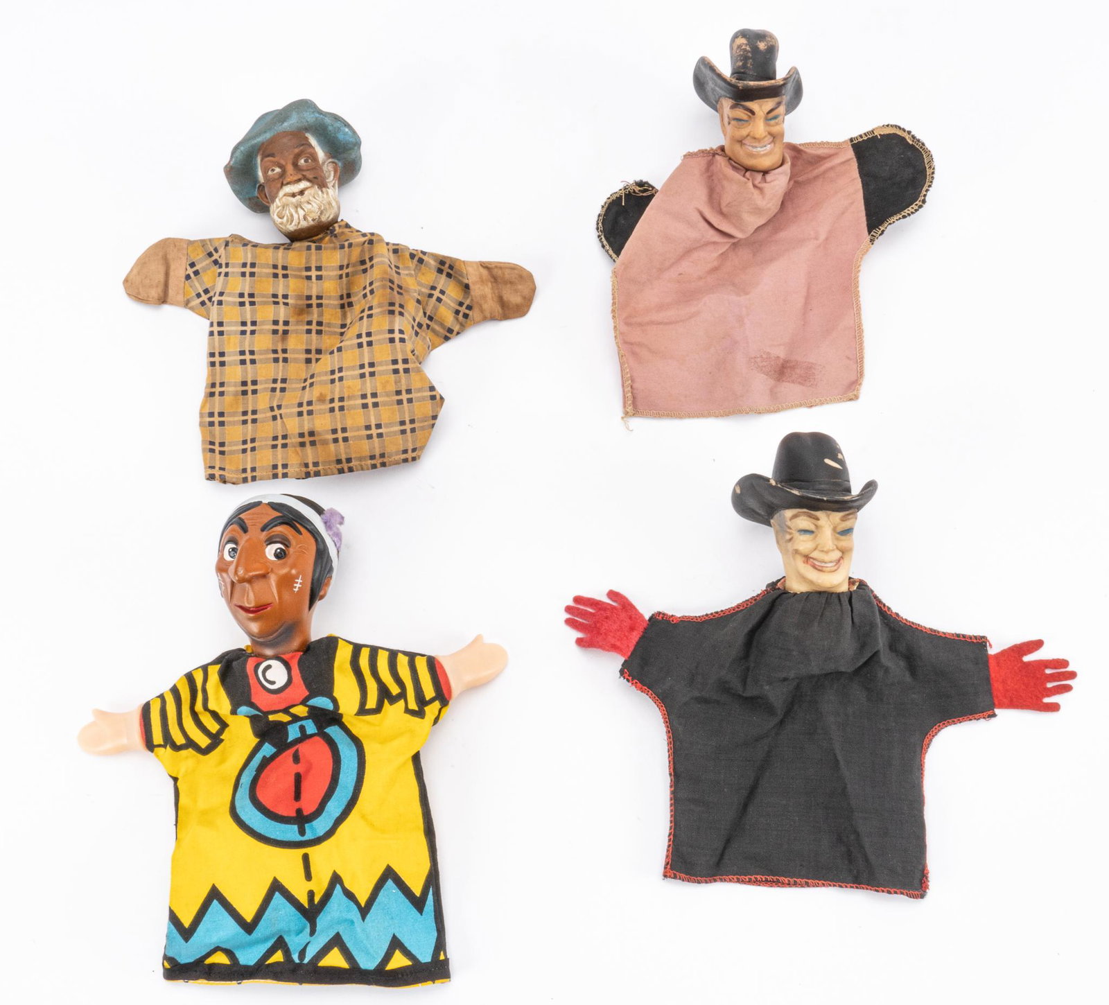(4) Finger Puppets: Collection of four (4) various finger puppets, all of differing characters height 10 in. x width 9 in. x depth 3.5 in. Provenance: An Alamo Heights, Texas collection We happily provide seamless shippi