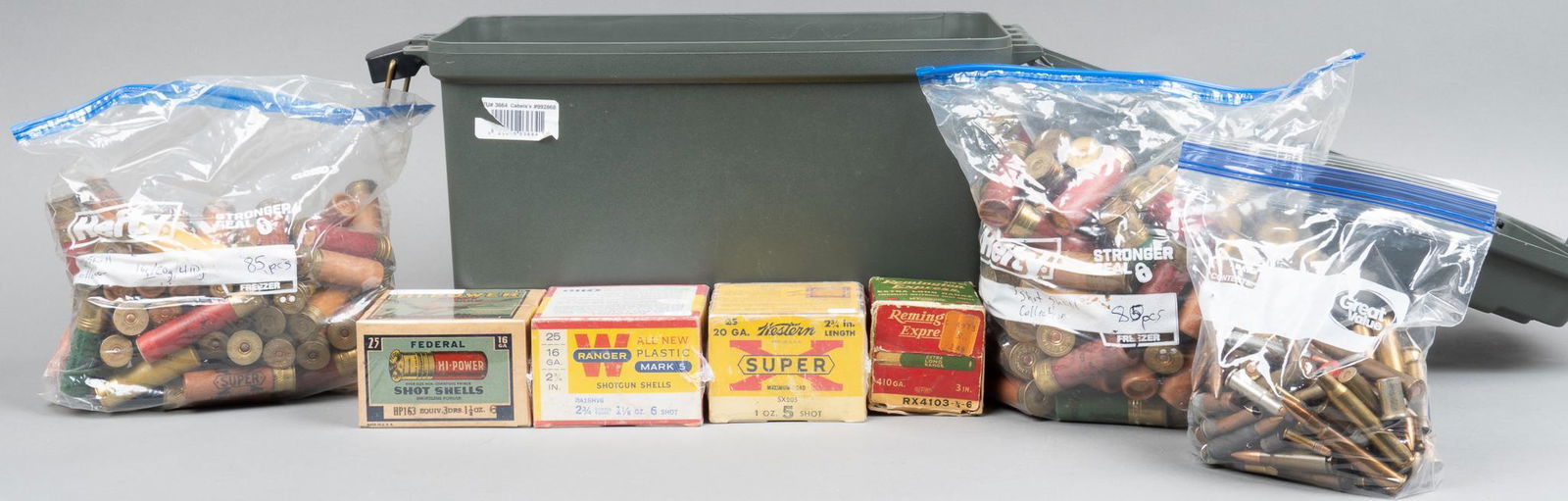 Collection of Vintage Rifle and Shotgun Ammunition: Includes: -3 boxes of 16 gauge shells, including Winchester and Federal -1 box of Winchester 20 gauge -1 partial box of Remington 410 bore shells -165 paper shot shell collection, 12, 16, 20, & 4