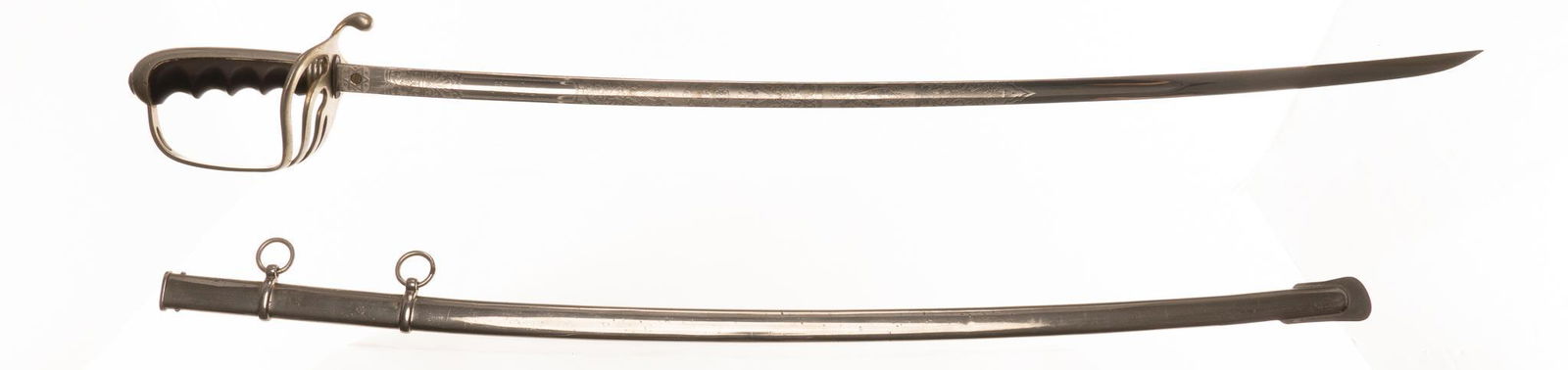 U.S. Model 1902 N.S. Meyer Spartan Dress Saber: Maker: N.S. Meyer, Spartan Blade Length: 29.75" long Overall Length: 35.5" long Condition: Good; blade has very light wear w/ some light rust patches along the edge; handle & handguard ha