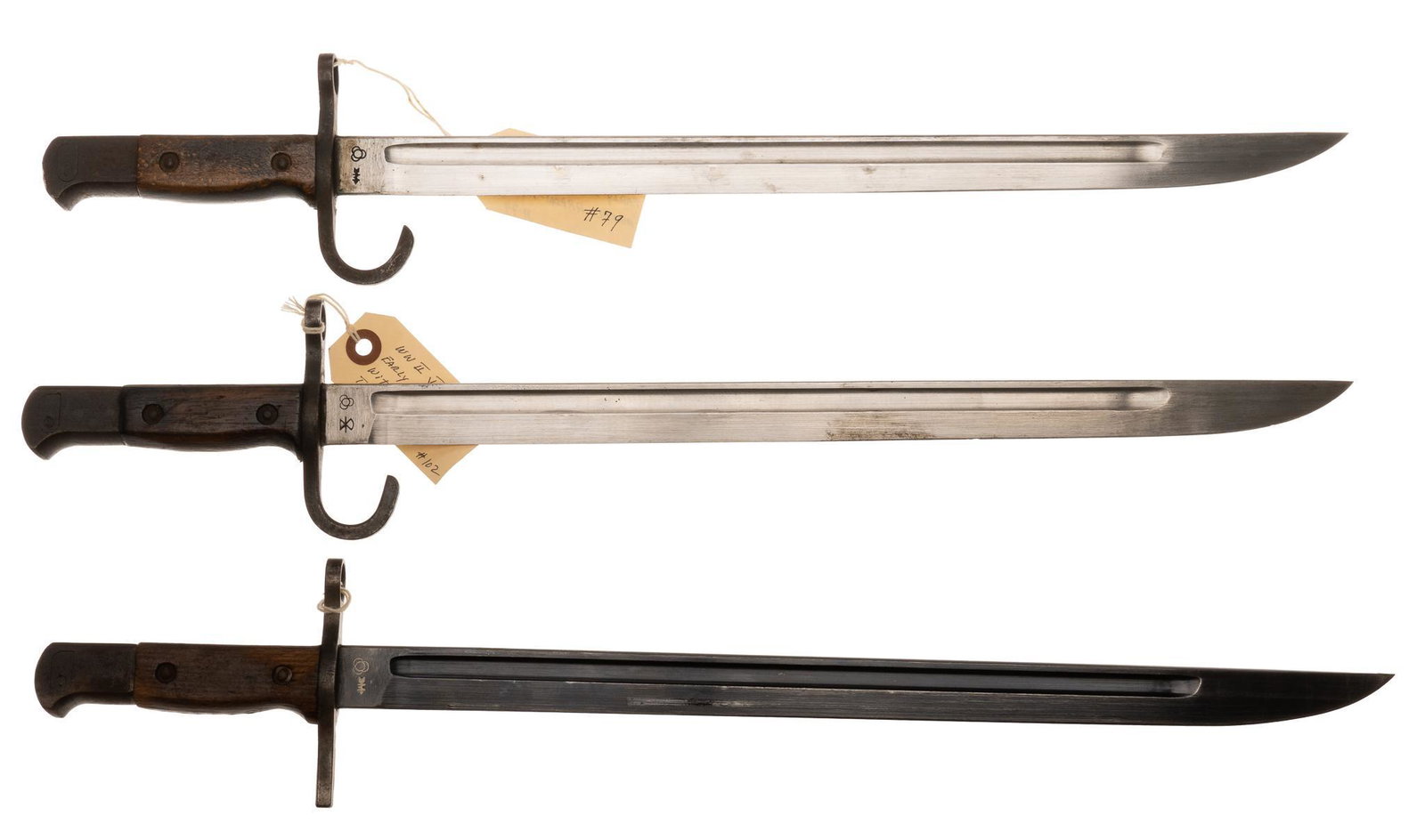 3 Japanese Type 30 Arisaka Bayonets W/ Scabbards: Includes: Three Japanese Type 30 bayonets w/ scabbards Manufacturer: (1) Hikari Seki arsenal bayonet; (2) Matsushita Kinzoku arsenal bayonet (late) (3) Matsushita Kinzoku arsenal bayonet (early) Marke