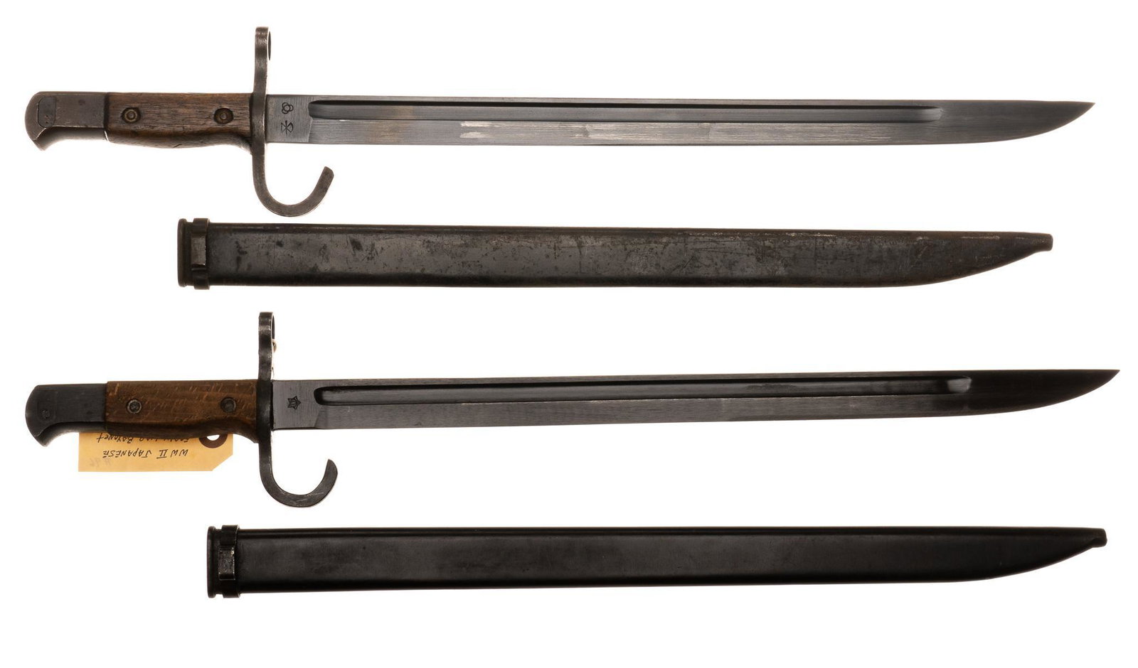 Pair of Japanese Type 30 Arisaka Bayonets W/ Scabbards: Includes: Two Japanese Type 30 bayonets w/ scabbards Manufacturer: (1) Jinsen Rikugun arsenal bayonet; (2) Hikari Seki arsenal bayonet Marked: (1) Jinsen Rikugun arsenal stamp on blade; "33487"