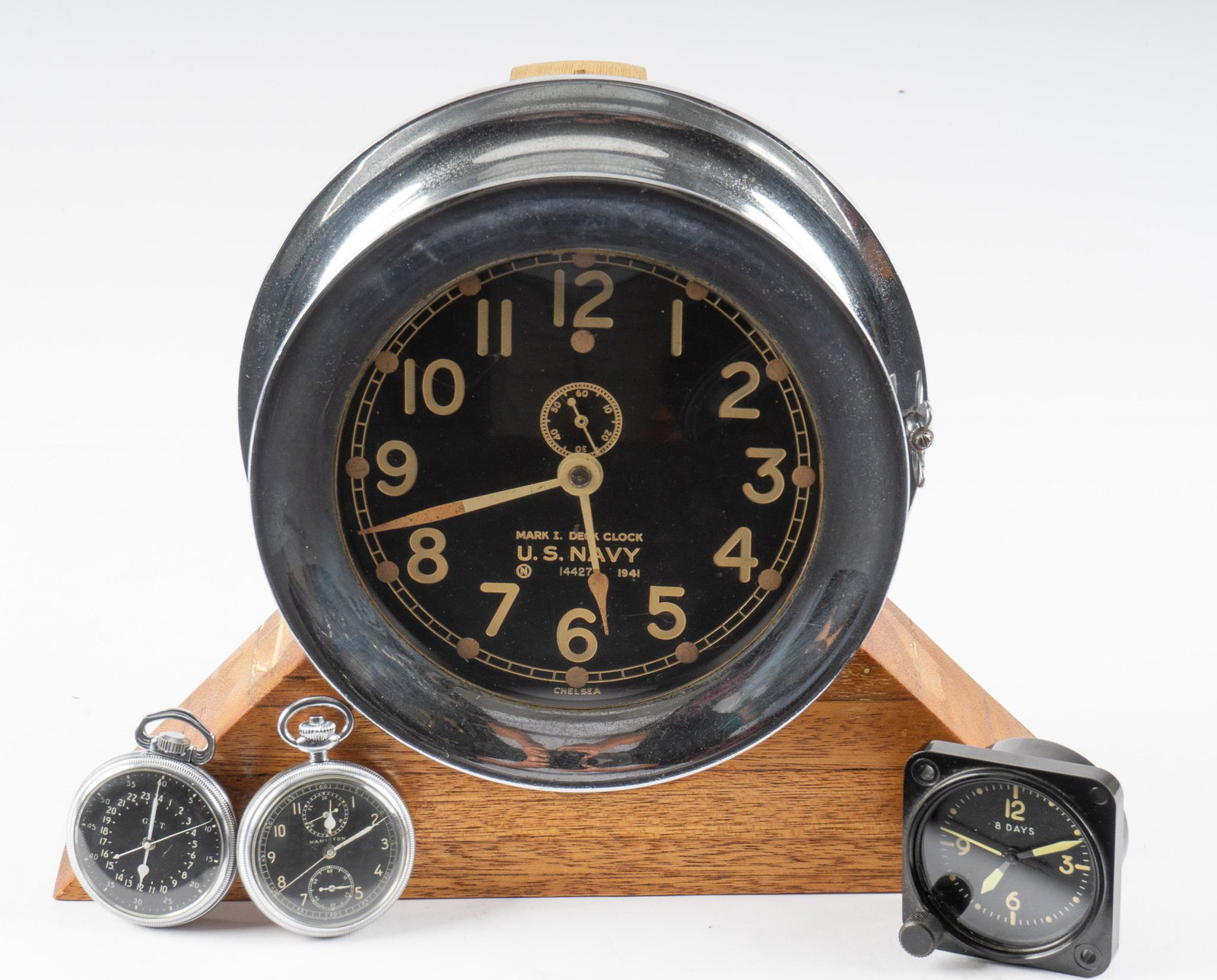 Collection of 4 WWII US Military Timepieces: Includes: -WWII US Waltham 8-Day Aircraft clock; SN: AN5743-TIA; running -WWII US Hamilton Watch Co. GCT 22-Jewels AN-5740 pocket watch; not running, movement clean, balance wheel moves well, hands no