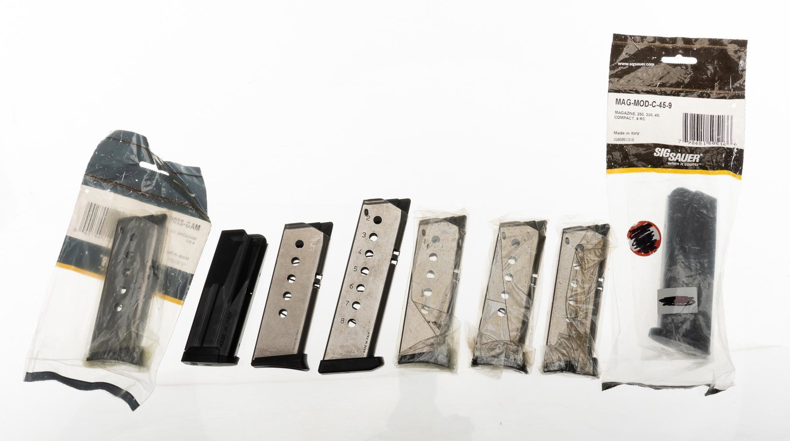 Collection of 8 Sig Sauer .45ACP Magazines P320 P220: Including: -1 P320/250 .45ACP 6 round compact magazine -1 P320/250 .45ACP 9 round compact magazine -5 P220/245 .45ACP 6 round compact magazines -1 P220 .45ACP 8 round magazine Provenance: A New Braunf