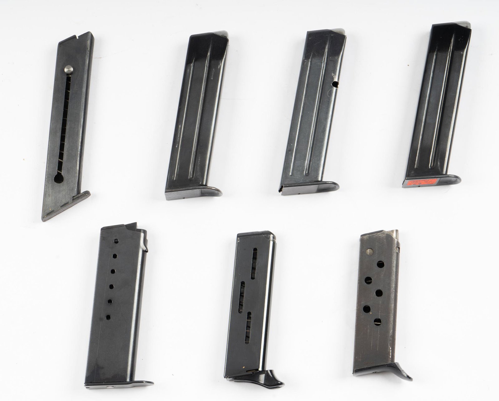 Collection of 7 Mixed European CF Magazines: Includes: -3 x Mauser HSC Super / Interarms Import .32 Auto magazines; 10-rd capacity -Walther PPK magazine; 9mm Kurz/ .380; 6-rd capacity; early factory -H-K P7 M8 9mm magazine; 8-rd capacity; Pro Ma