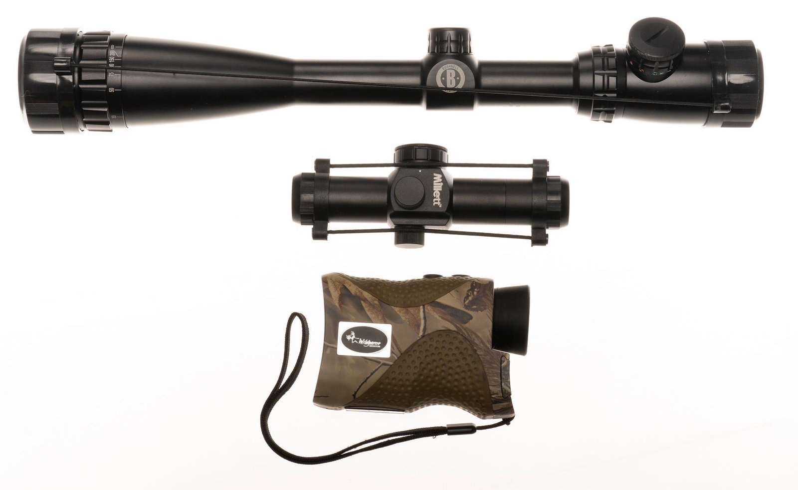 Lot of Bushnell Scope, Millet Red Dot, & Wildgame Range Finder: Includes: -Wildgame Innovations range finder -Millet Red Dot 1x20 sight, 3 MOA dot -Bushnell Banner 4-16x40mm scope Condition: Very good; very light wear/use, all functional Provenance: The Estate of 