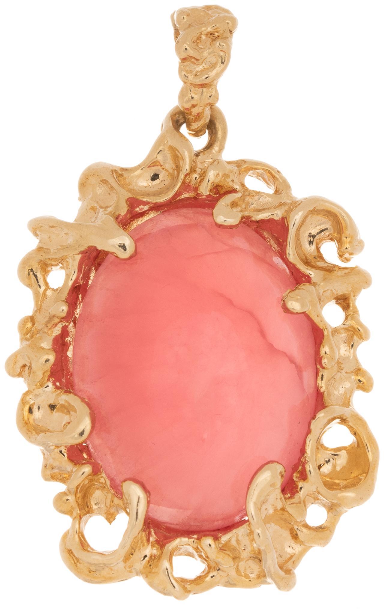 Modernist Pink Tourmaline 14k Gold Pendant: Pink tourmaline (approx 29.75 ct) oval cabochon in 14k yellow gold reticulated Modernist setting with articulated bale. Length 1 3/4 in (including bale); total weight 16.3 grams Provenance: A Terrell 