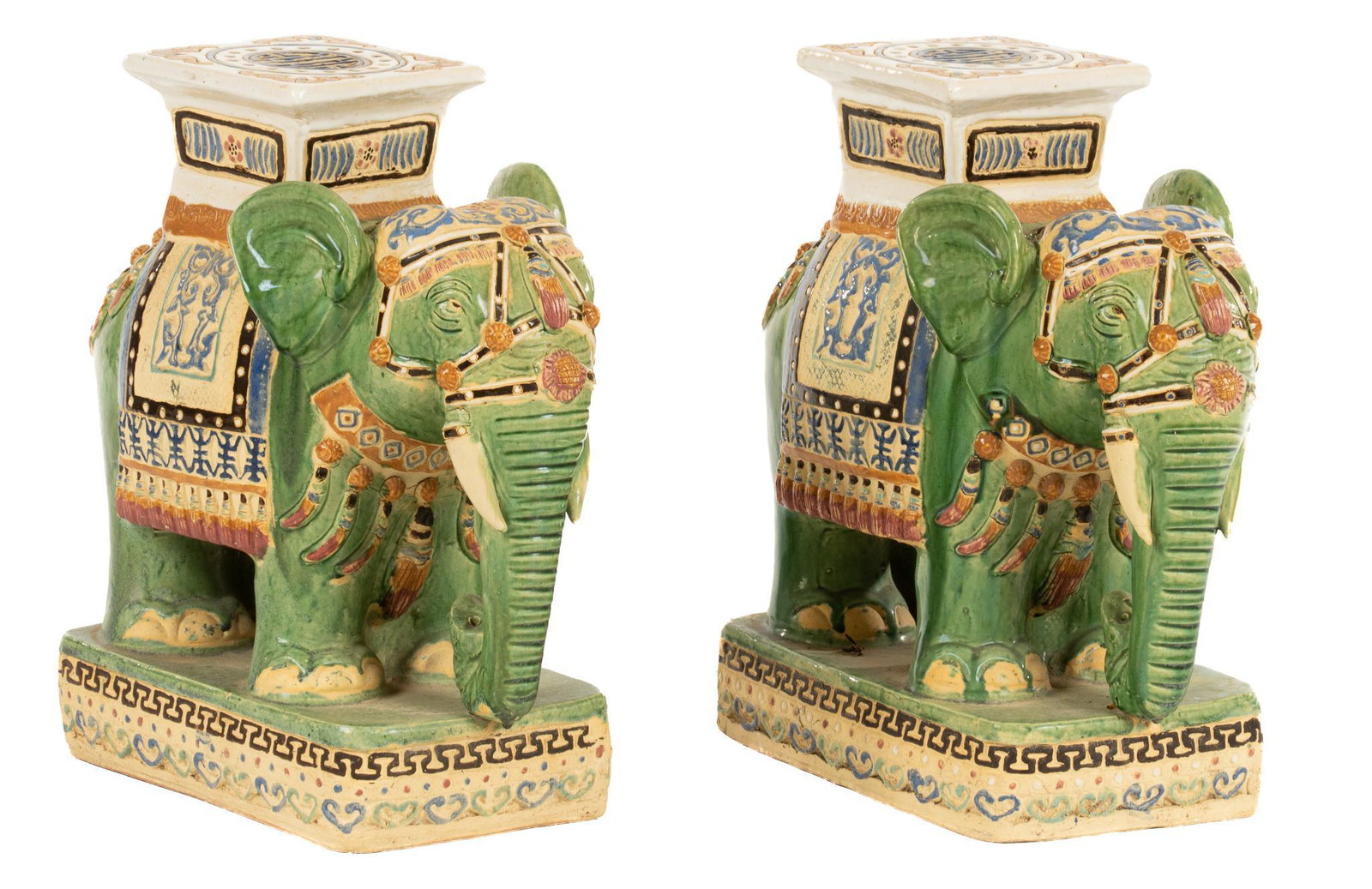 Pair of Elephant Garden Stools: Pair of ceramic elephant garden stools, featuring figural elephant bodies, with polychrome glazing height 21 in. x width 10.5 in. x depth 18 in. / each Provenance: the Estate of a former McNay Museum 