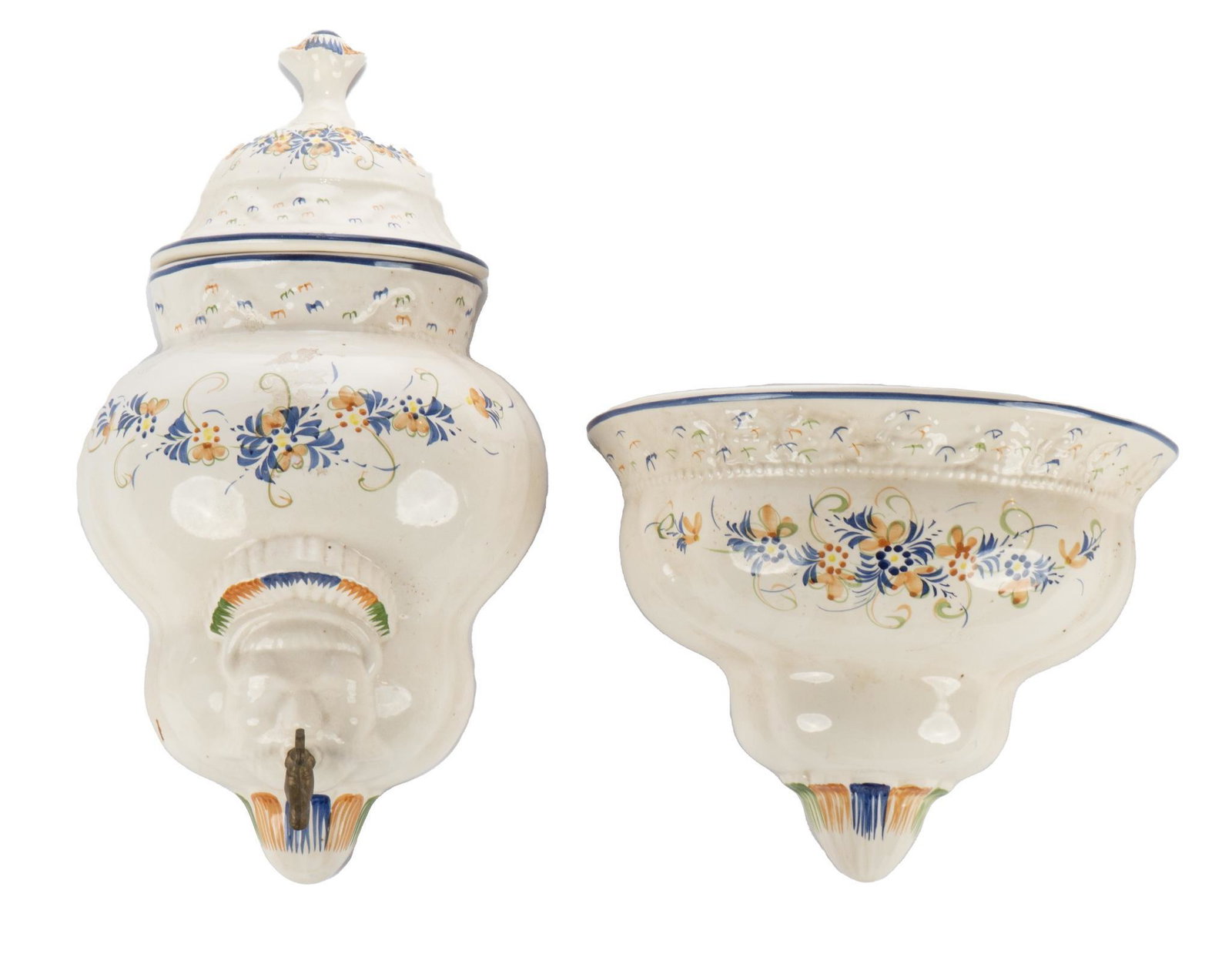 Italian Decorative Fountain: Italian decorative wall mounted fountain, with porcelain lavabo and basin, featuring glazed polychrome accents, marked "SSO" to back height 20 in. x width 16.5 in. x depth 5.5 in. We happily p