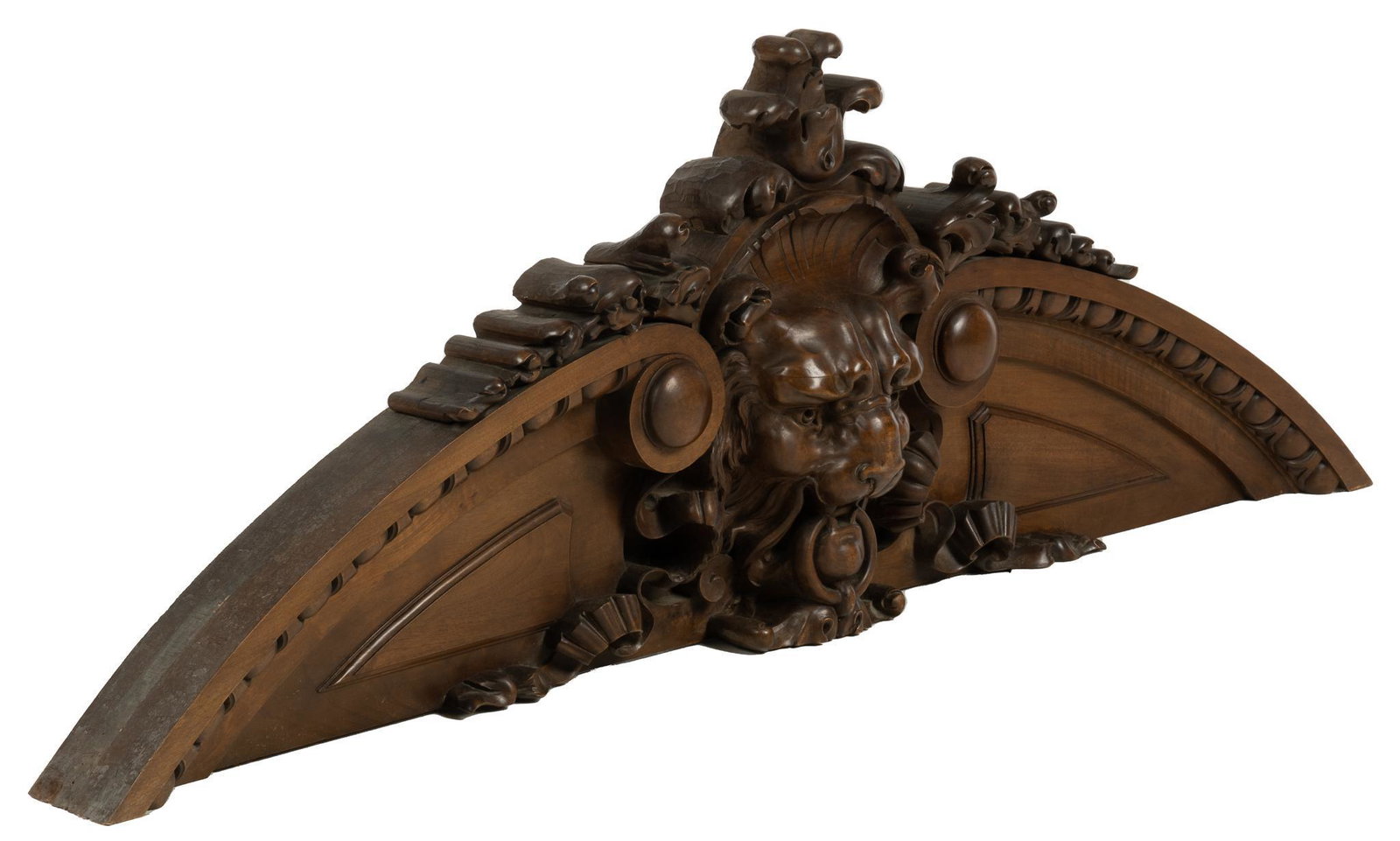 French Renaissance Style Pediment: French Renaissance style wood pediment, heavily carved featuring a lion's head at center height 23 in. x width 67 in. x depth 9 in. We happily provide seamless shipping services on everything we s