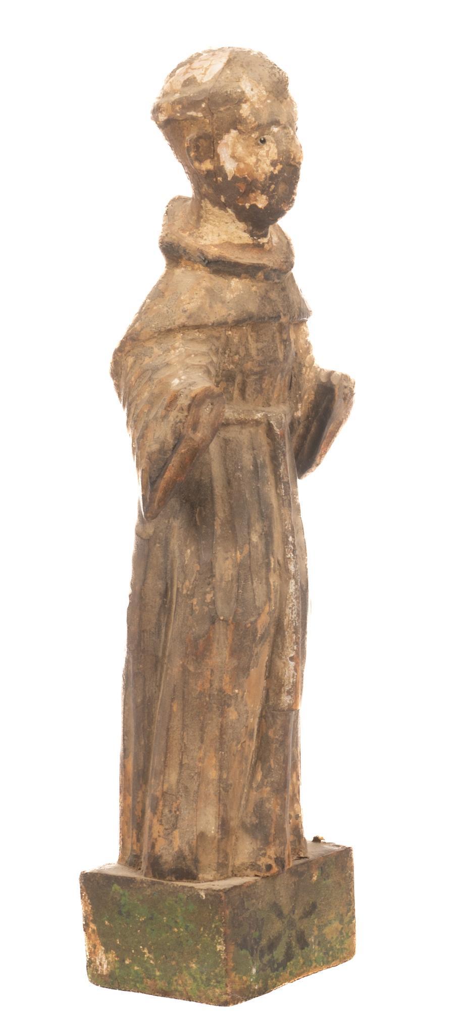 Carved Wooden Santo: Carved wooden santo, depicting Franciscan monk height 14 in. x width 3.5 in. x depth 3 in. Provenance: a San Antonio, Texas collection We happily provide seamless shipping services on everything we se
