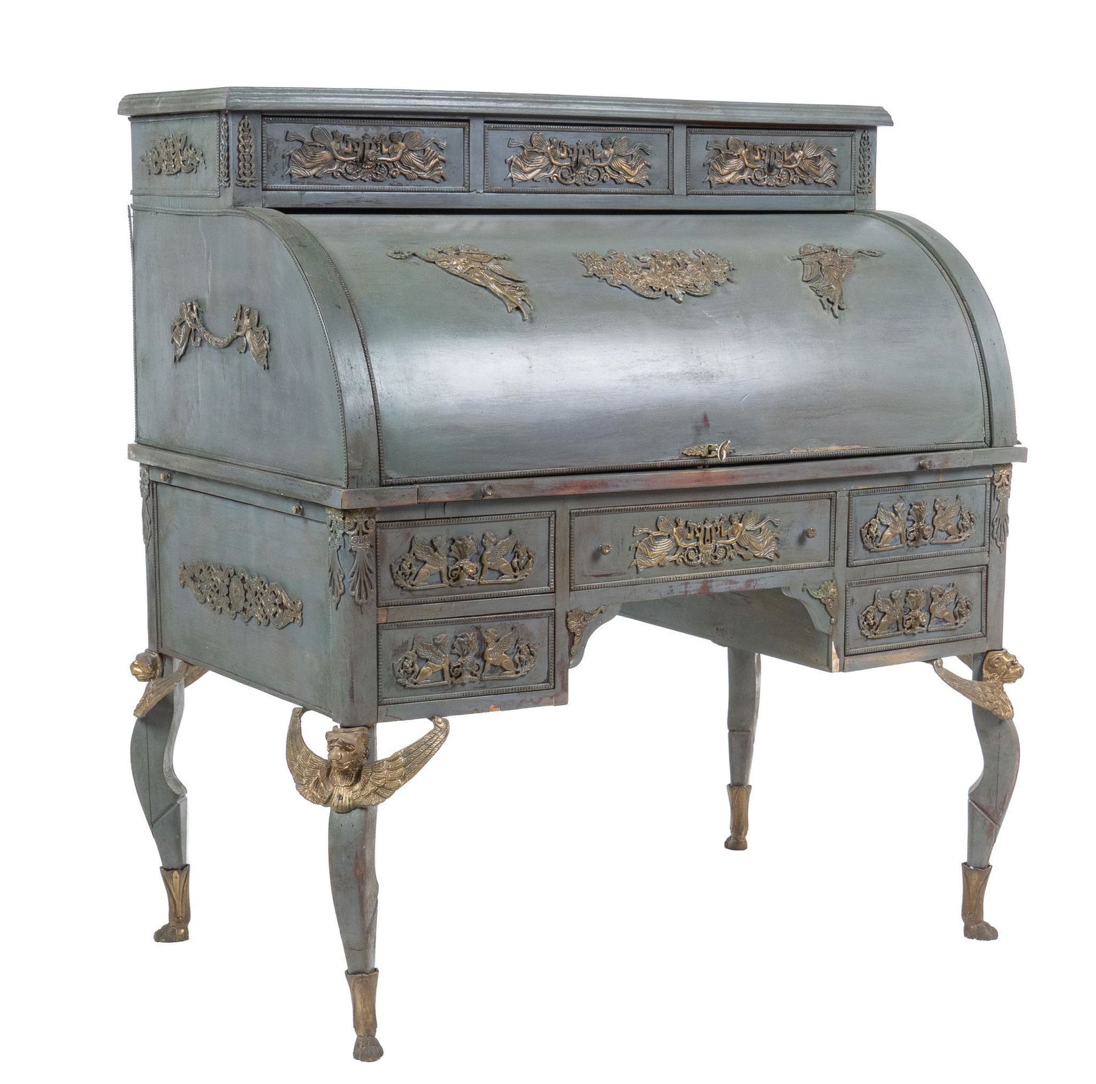Empire Style Secretary Desk: Empire style secretary desk, painted, with carved mythological motifs throughout including sphinxes, three drawers above roll top door opening to interior with six drawers and open storage niche, slid