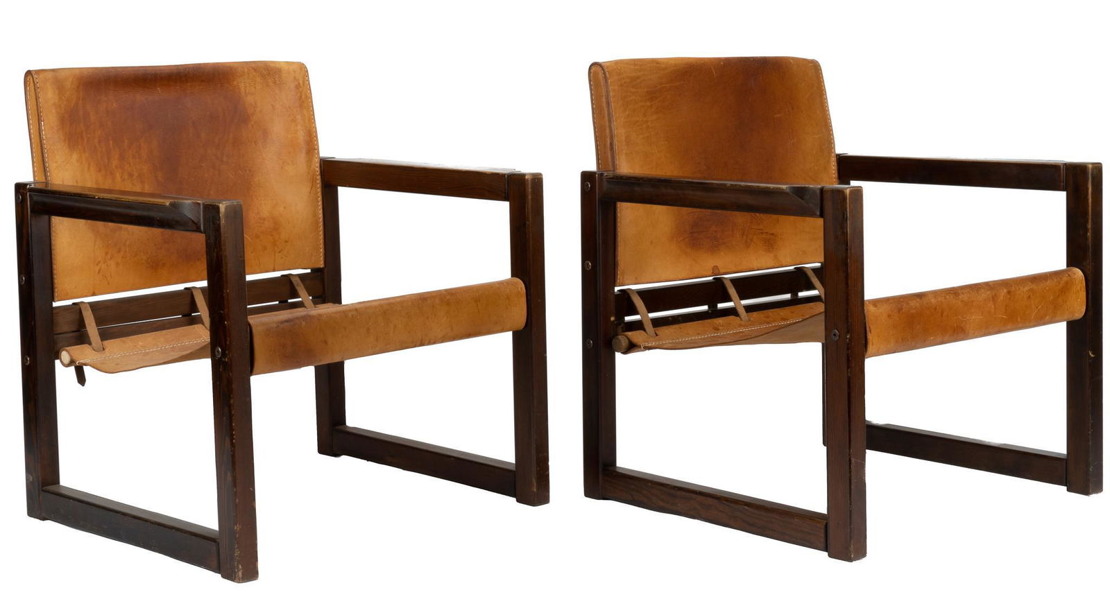 Pair of Vintage IKEA Chairs: Pair of brown leather vintage IKEA armchairs with wooden frames, in the style of the "Diana" chair designed by Karin Mobring, circa 1970 height 28 in. x width 26 in. x depth 23 in. We happil