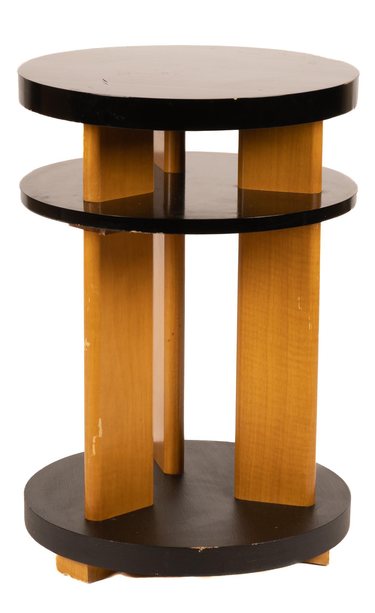 Brown Saltman Art Moderne Style Side Table: Brown Saltman Art Moderne style side table, after design by Paul Laszlo (1900-1993, Hungary), featuring geometric round motif, with round black top, above round storage tier, supported on three planar