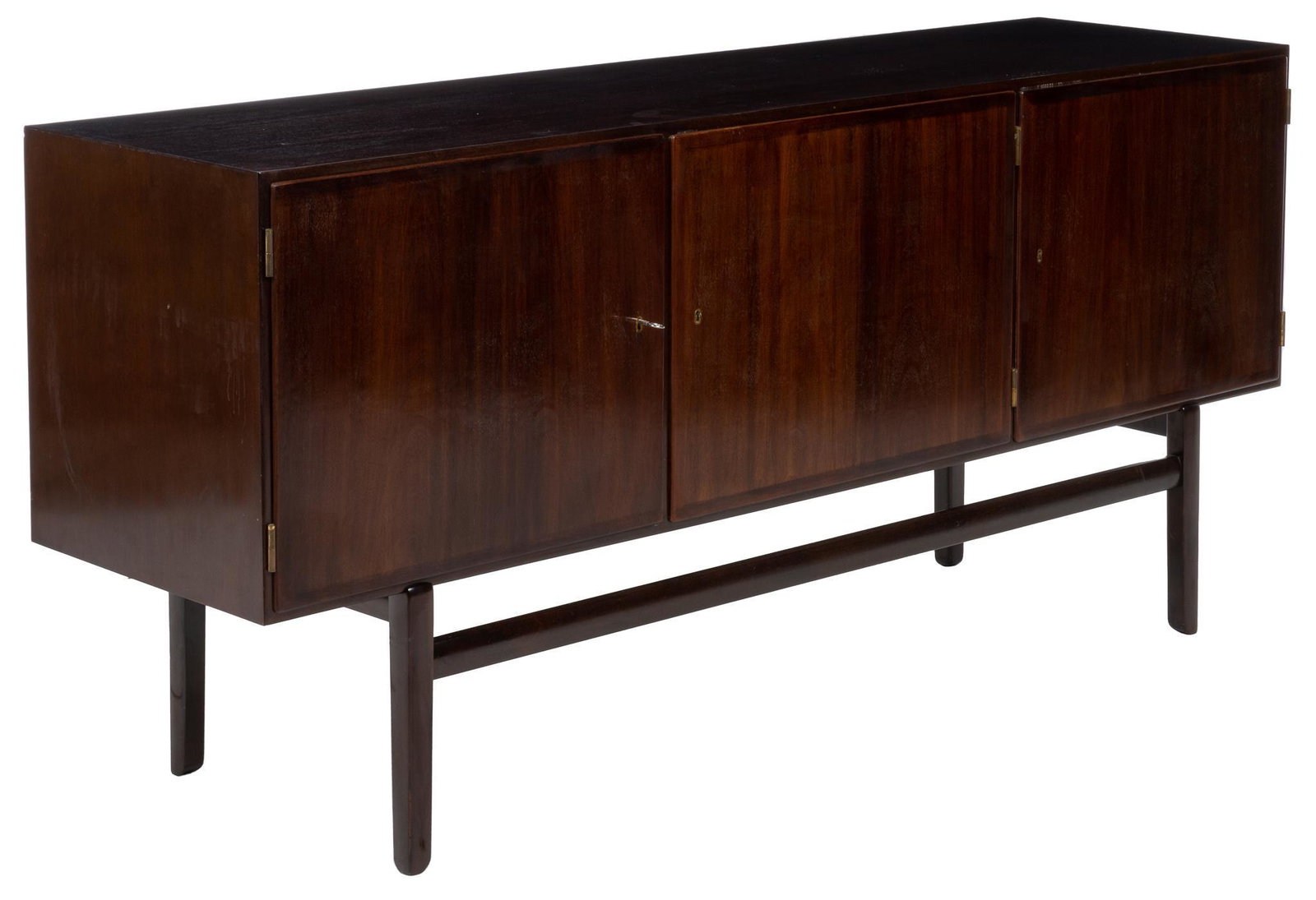 Danish Mid-Century Credenza: Danish Mid-Century credenza / sideboard, with right and left doors opening to a single shelf interior, the center door opening to interior storage with two tray drawers, supported on stretchered legs,