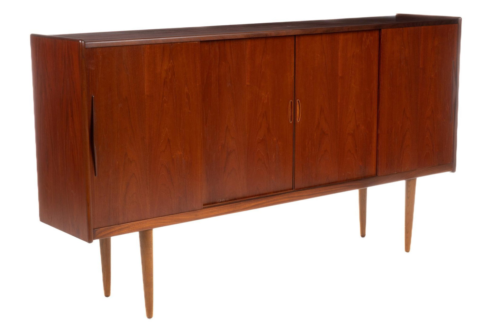 Mid-Century Credenza: Mid-Century credenza / sideboard, with right sliding door opening to a three adjustable shelf interior, left sliding door opening to interior storage with five tray drawers, two center sliding doors o