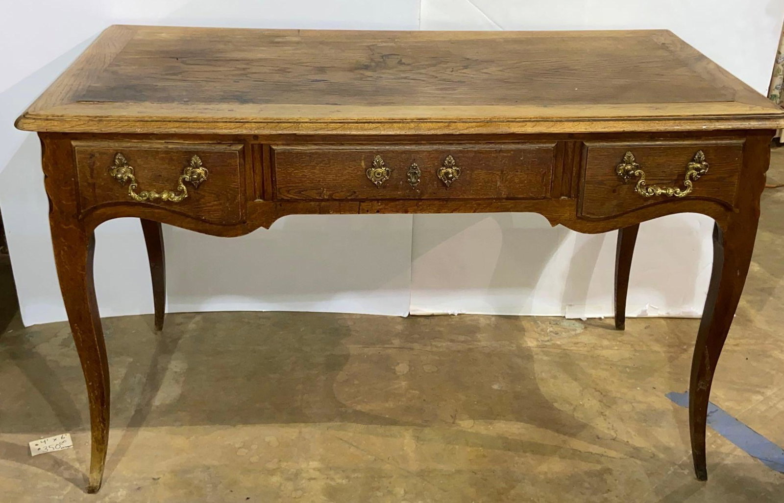 Writing Desk: Writing desk, three drawers We happily provide seamless shipping services on everything we sell. Please email us at shipping@vogtauction.com or call 210-971-5750 for more information.