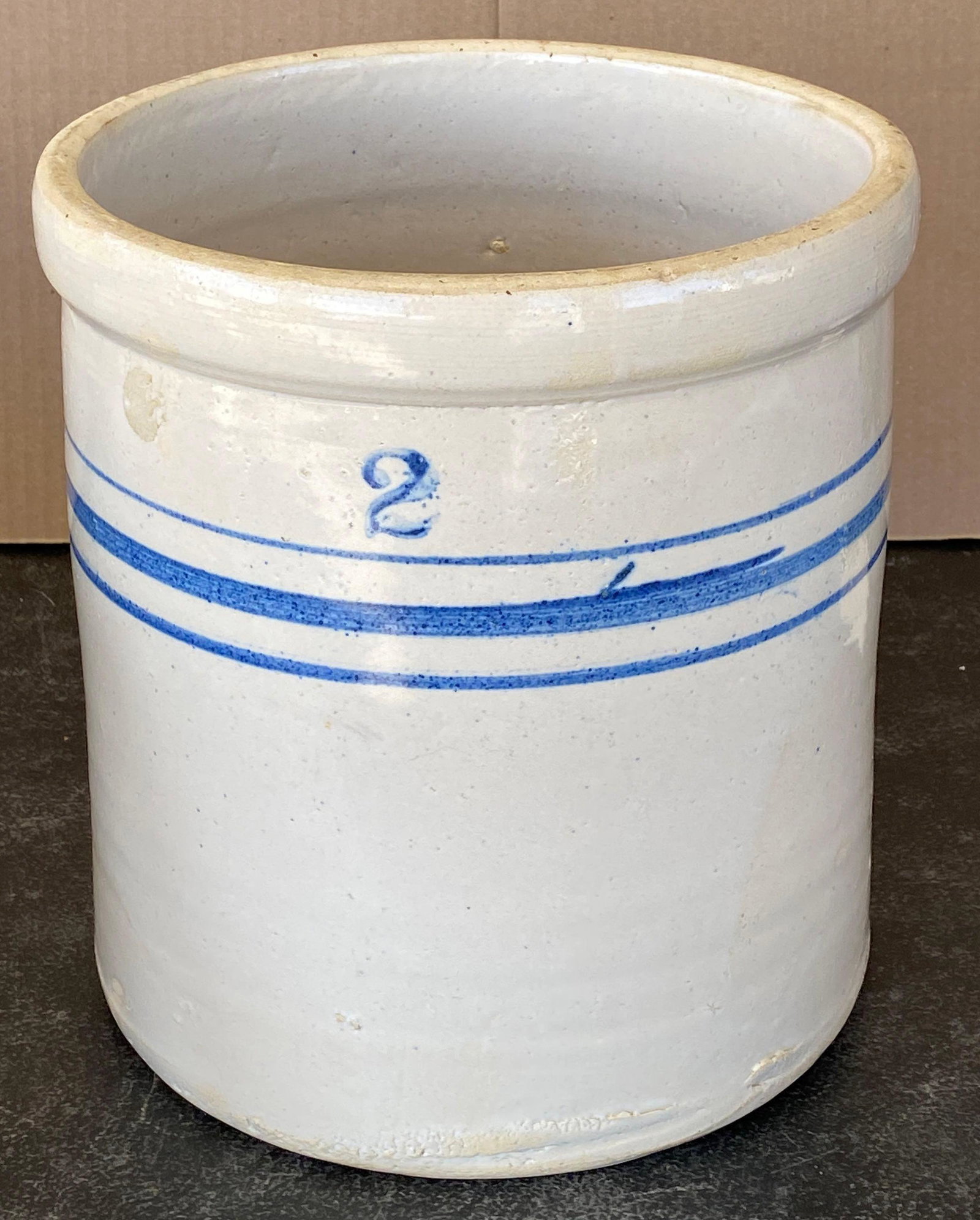 2-Gallon Crock: 2 gallon crock, marked 2 height 10.5 in. x diameter 9.5 in. We happily provide seamless shipping services on everything we sell. Please email us at shipping@vogtauction.com or call 210-971-5750 fo