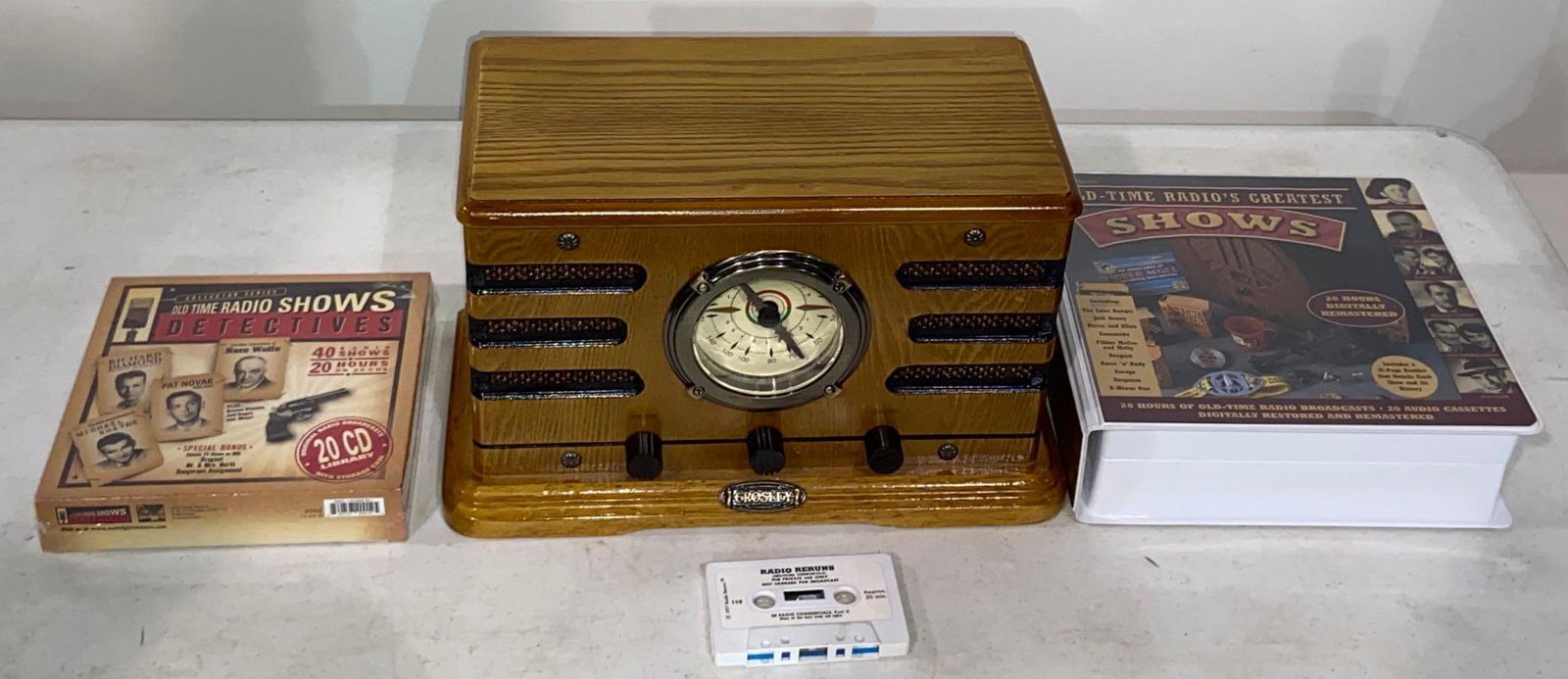 Vintage Radio and Cassettes: Vintage radio and cassettes height 8.5 in. x width 14 in. x depth 7 in. / radio We happily provide seamless shipping services on everything we sell. Please email us at shipping@vogtauction.com or 