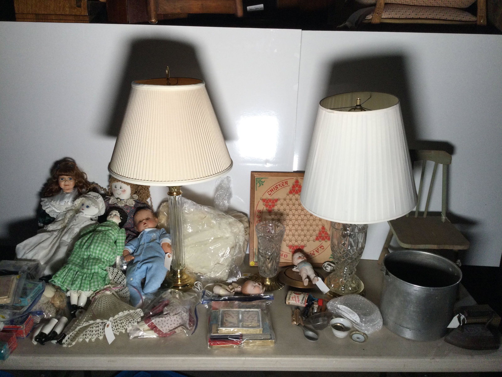 Lot of Vintage Home Decor: Lot of vintage home decor, to include lamps, dolls, dominoes, etc. height 34 in. x diameter 18 in. / table We happily provide seamless shipping services on everything we sell. Please email us at shipp