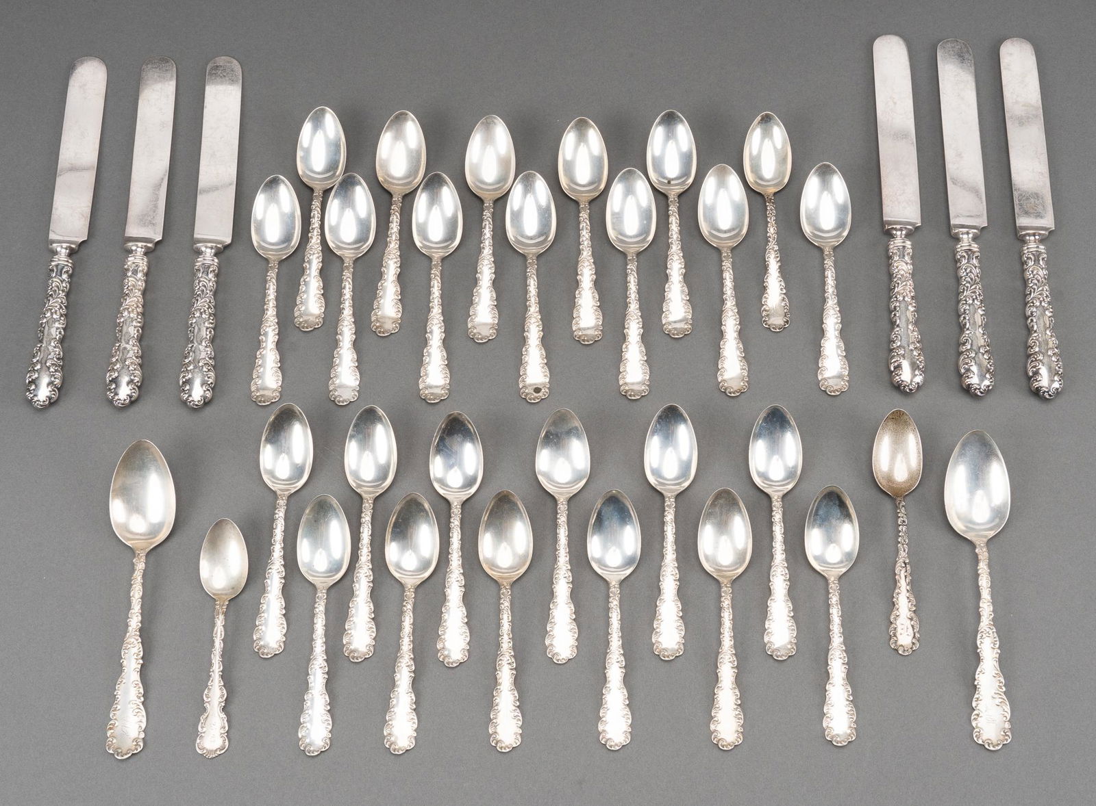 "Waverley" Wallace Sterling Silver Flatware Set: Partial service of "Waverley" by Wallace Silversmiths sterling silver flatware 35 pc; no monogram or removal, save for four spoons. Includes: 6 dinner knives 9 5/8 in. 25 teaspoons 2 oval sou