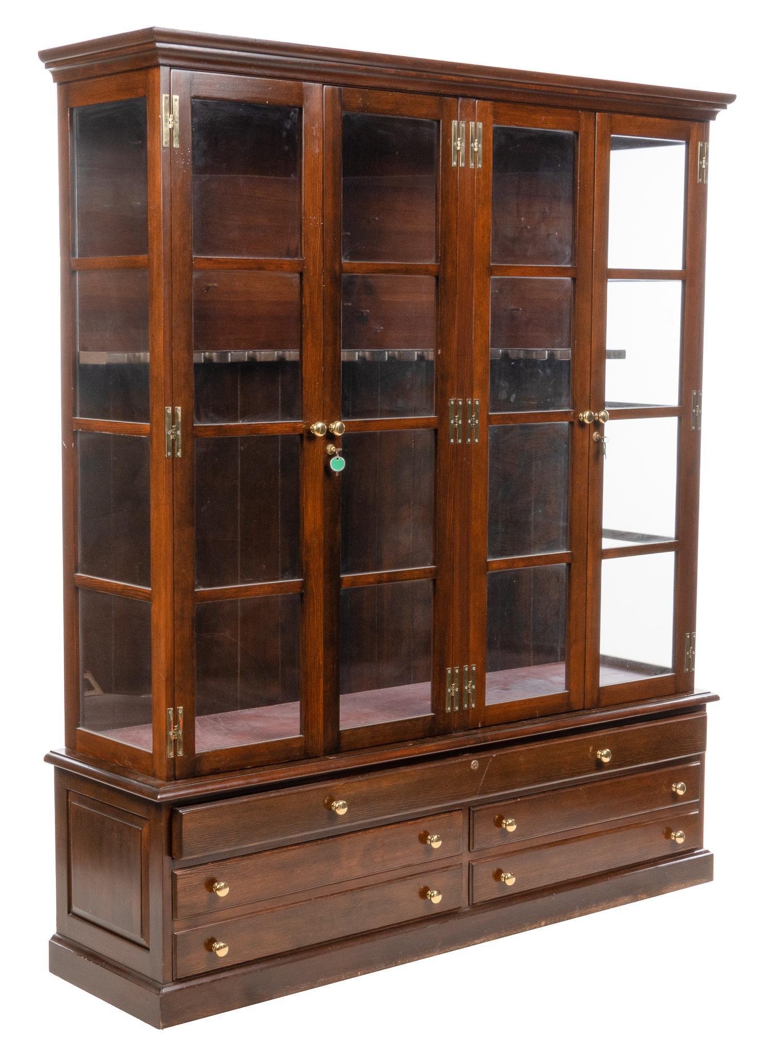 W.R. Dallas (San Antonio, TX) Gun Case: W.R. Dallas (San Antonio, Texas) display case, having glass paneled doors, opening to interior gun rack, above long flat drawer opening to storage compartments, over two stacks of two drawers, to incl