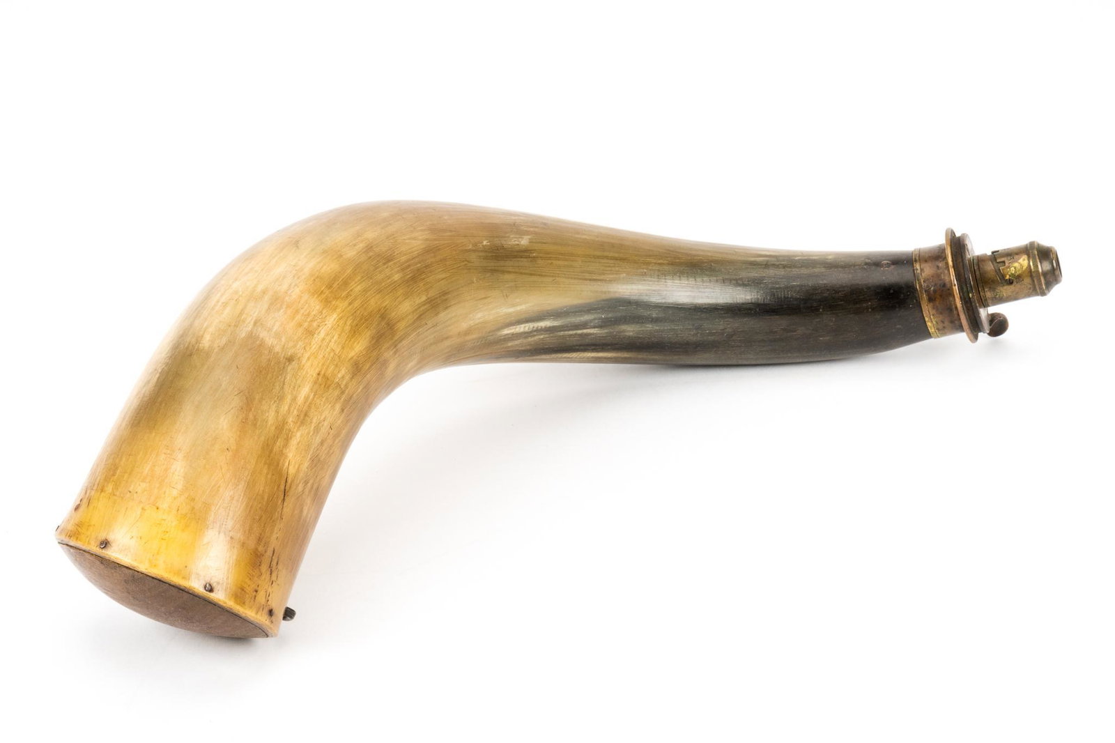 American Flask and Cap Co. Gun Powder Horn: Hand-carved American Flask & Cap Co. gun powder horn, with brass dispenser height 17 in. x diameter 4 in. Provenance: a Rockport, Texas collection We happily provide seamless shipping services on ever