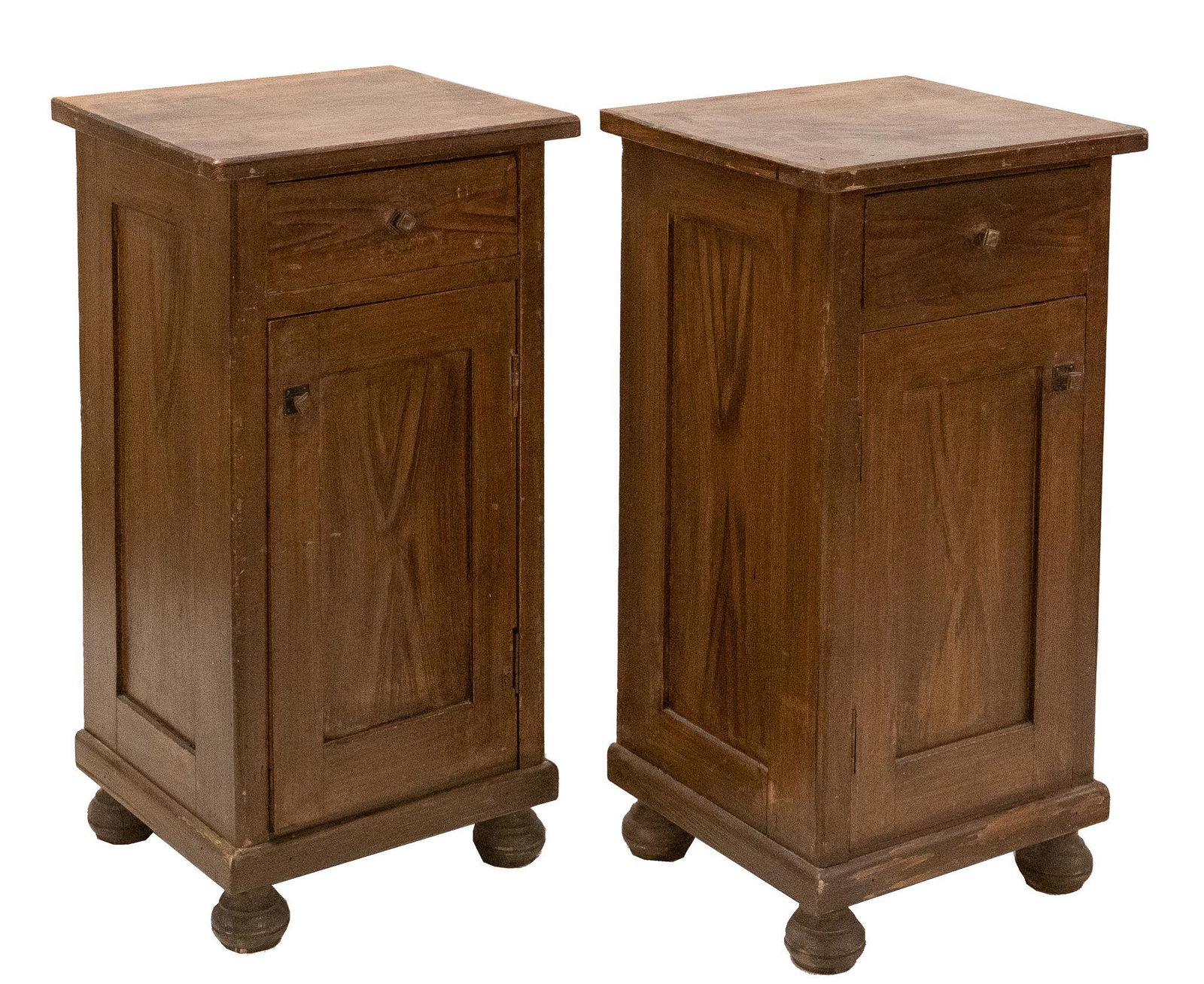 Pair of Farmhouse Nightstands: Pair of farmhouse nightstands, each with a single top drawer above one door opening to interior storage with one nightstand having a single shelf, supported on bun feet height 33 in. x width 17 in. x 