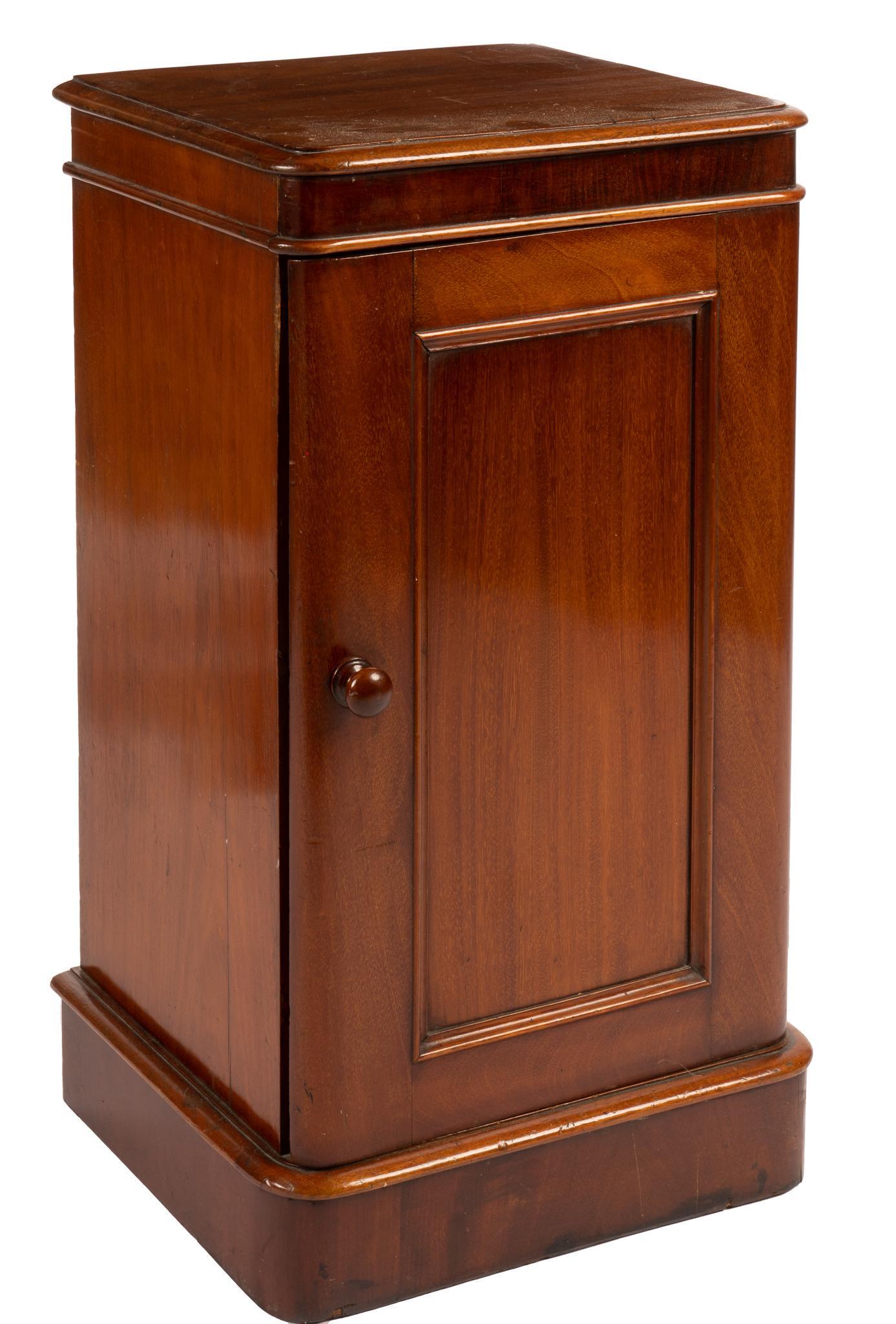 Nightstand: Nightstand, with square top, over cabinet door, opening to single shelf, supported on plinth base height 28.5 in. x width 16 in. x depth 14 in. Provenance: a San Antonio, Texas collection We happily p